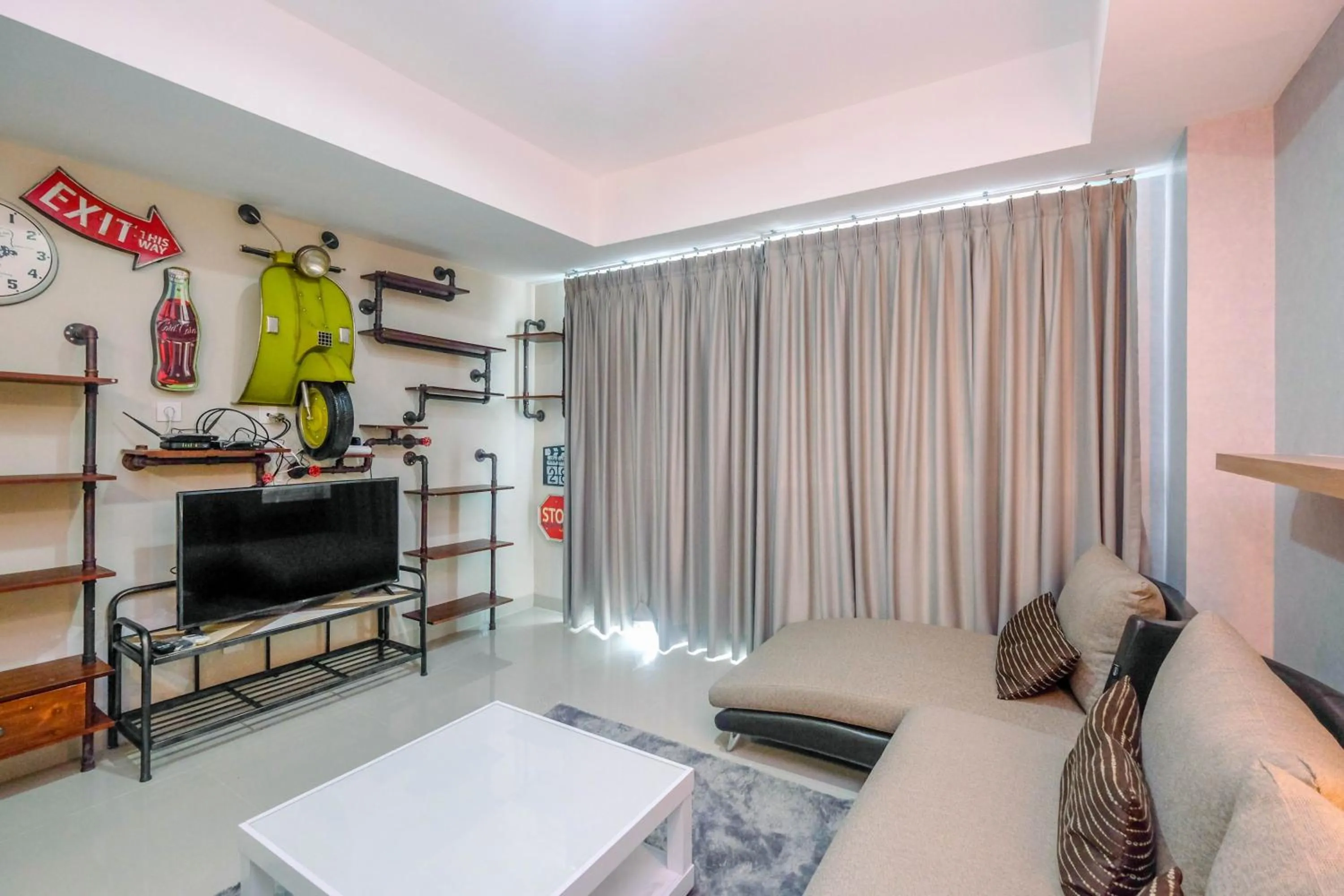 Cozy 2BR Apartment Nine Residence with City View By Travelio