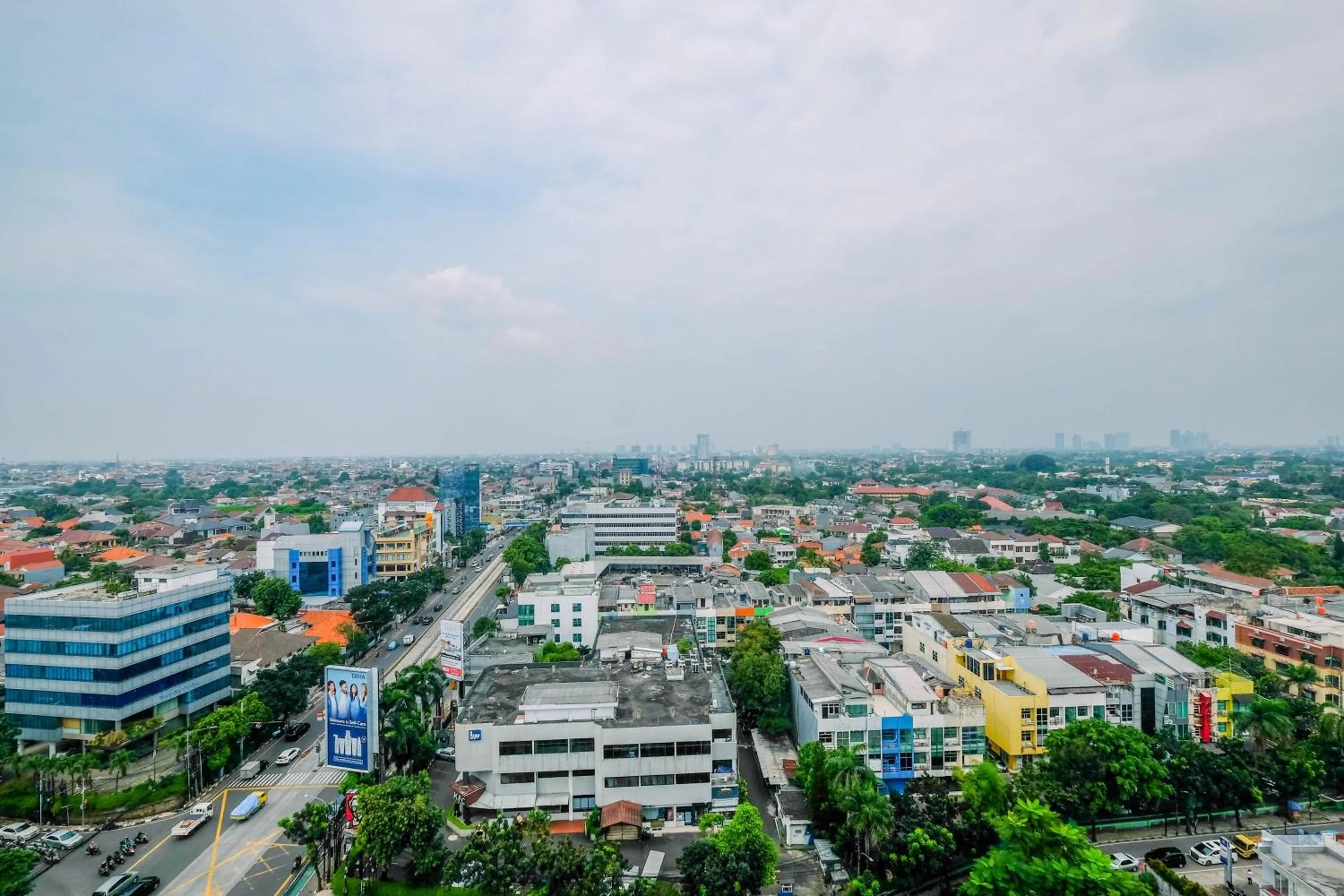 Cozy 2BR Apartment Nine Residence with City View By Travelio