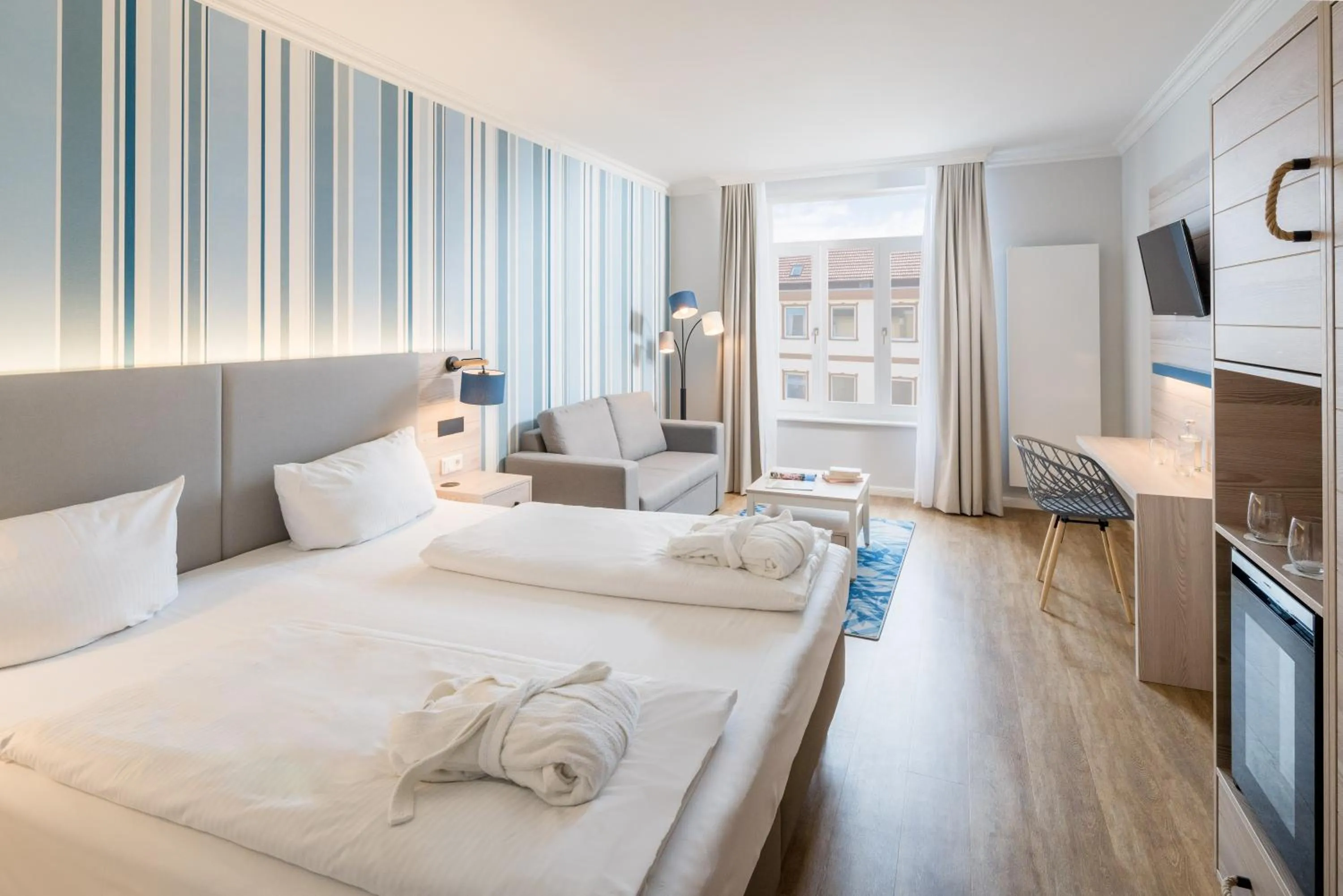 Photo of the whole room, Bed in Strandhotel Gerken