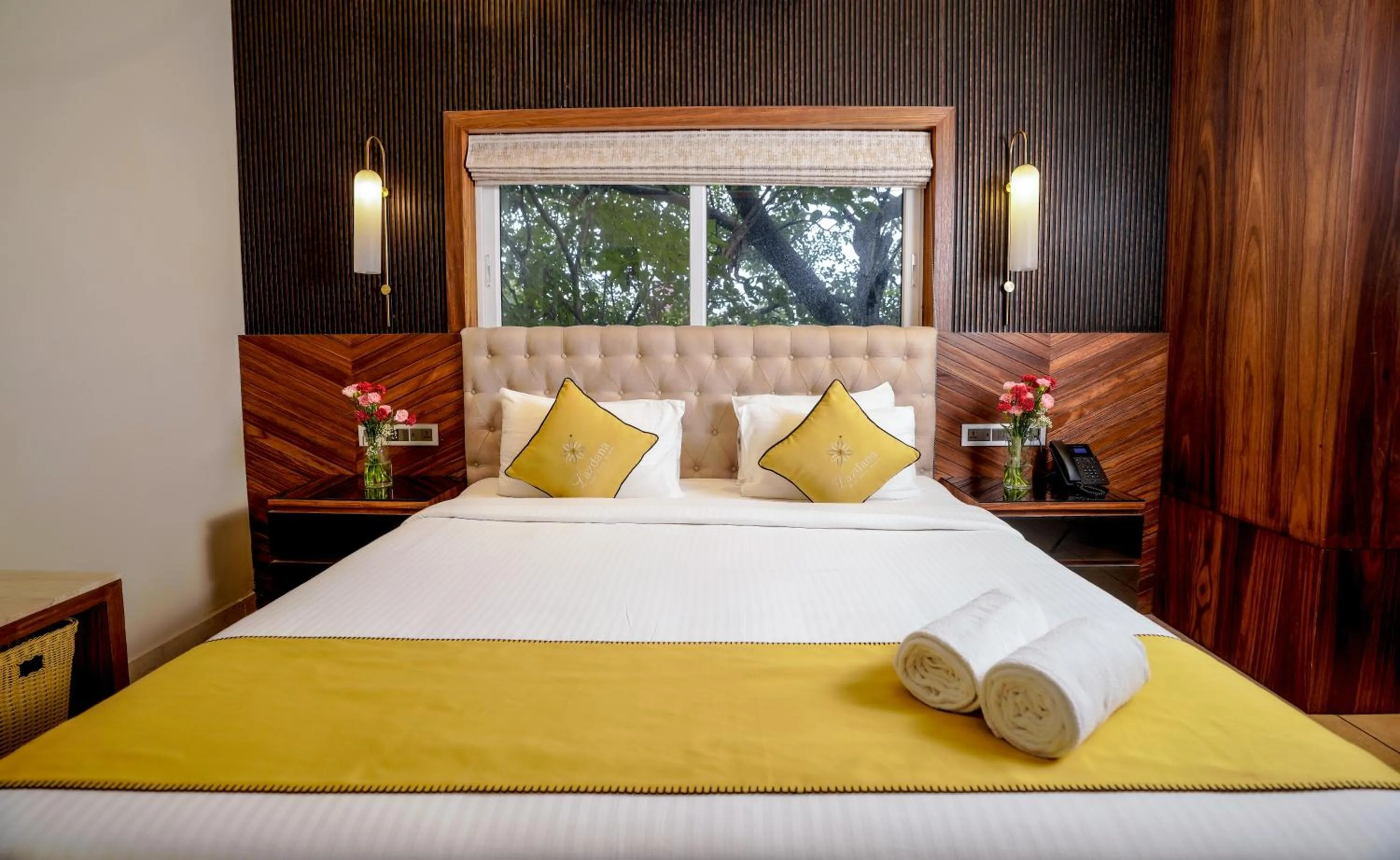Bed in Lazdana Hotel Bangalore