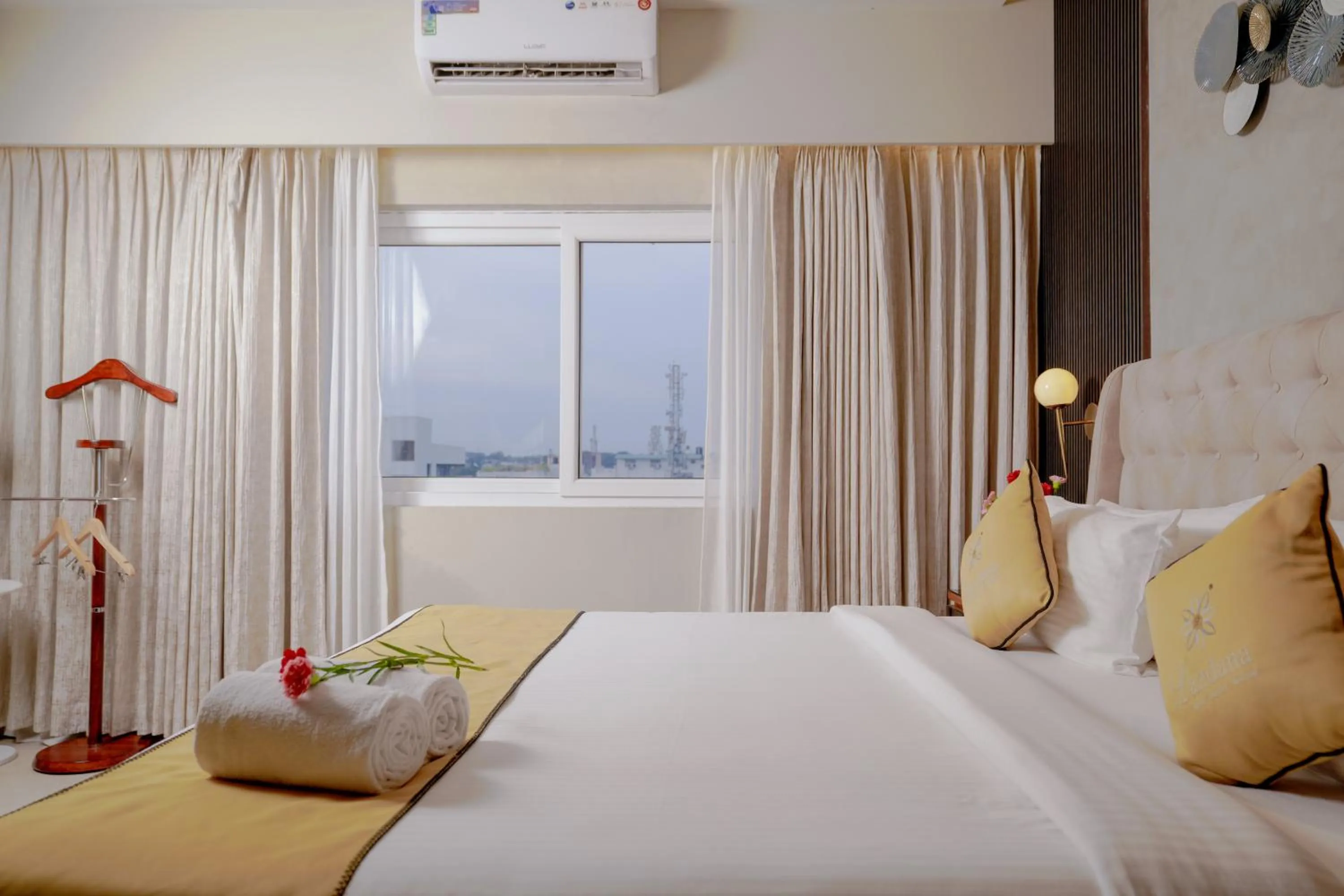 Bed in Lazdana Hotel Bangalore