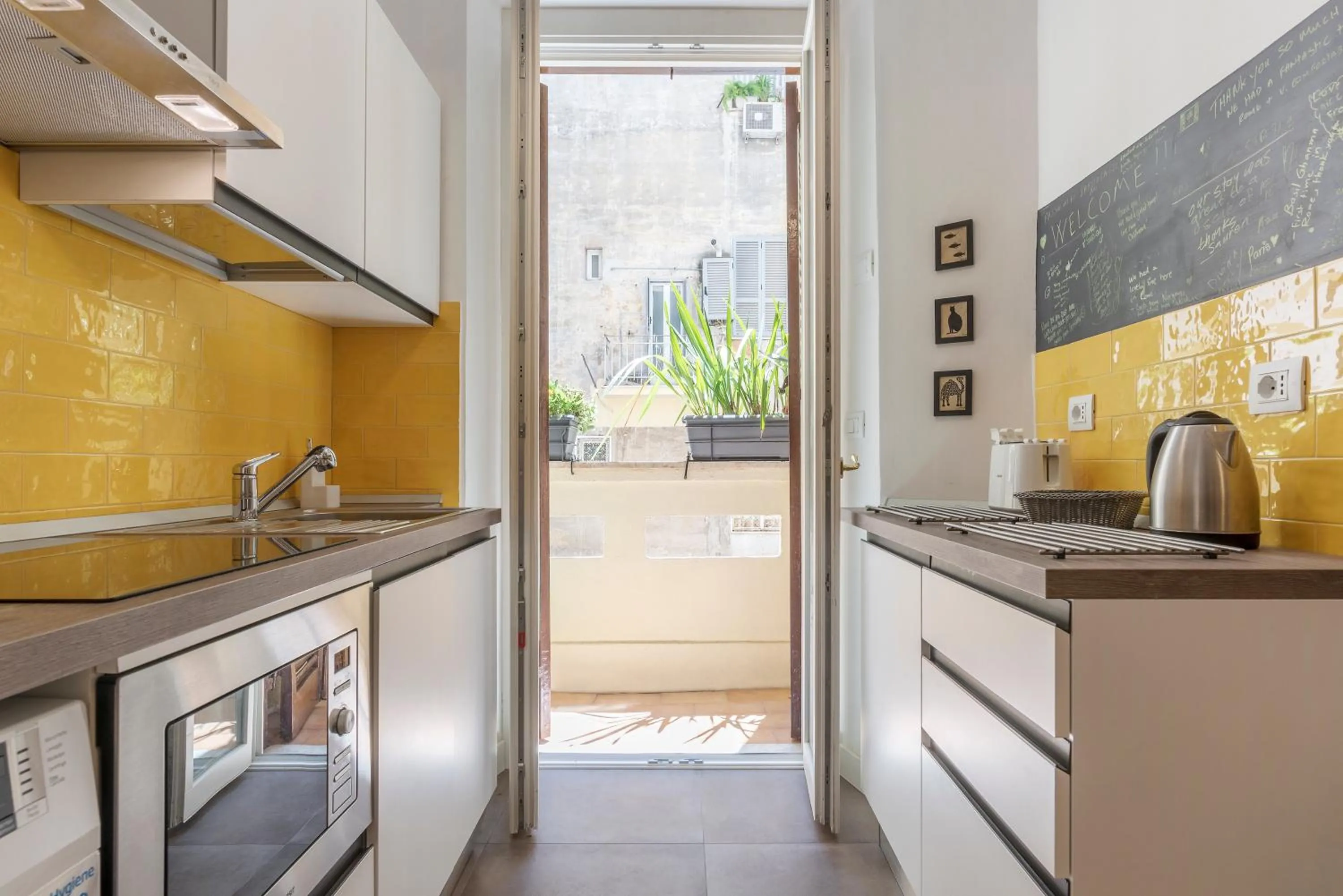 Kitchen or kitchenette in GuestHost - San Giovanni Laterano Cozy Flat