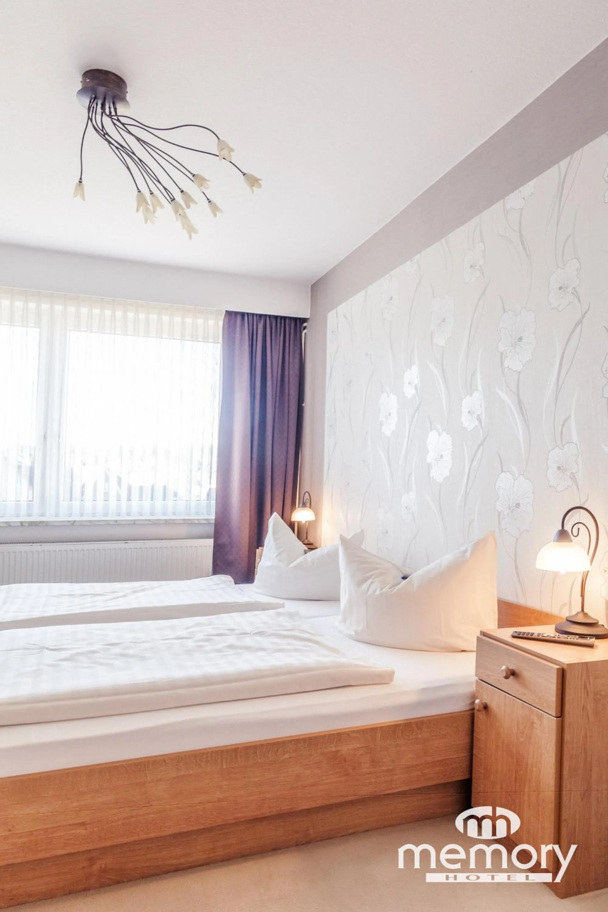 Photo of the whole room, Bed in Memory Hotel