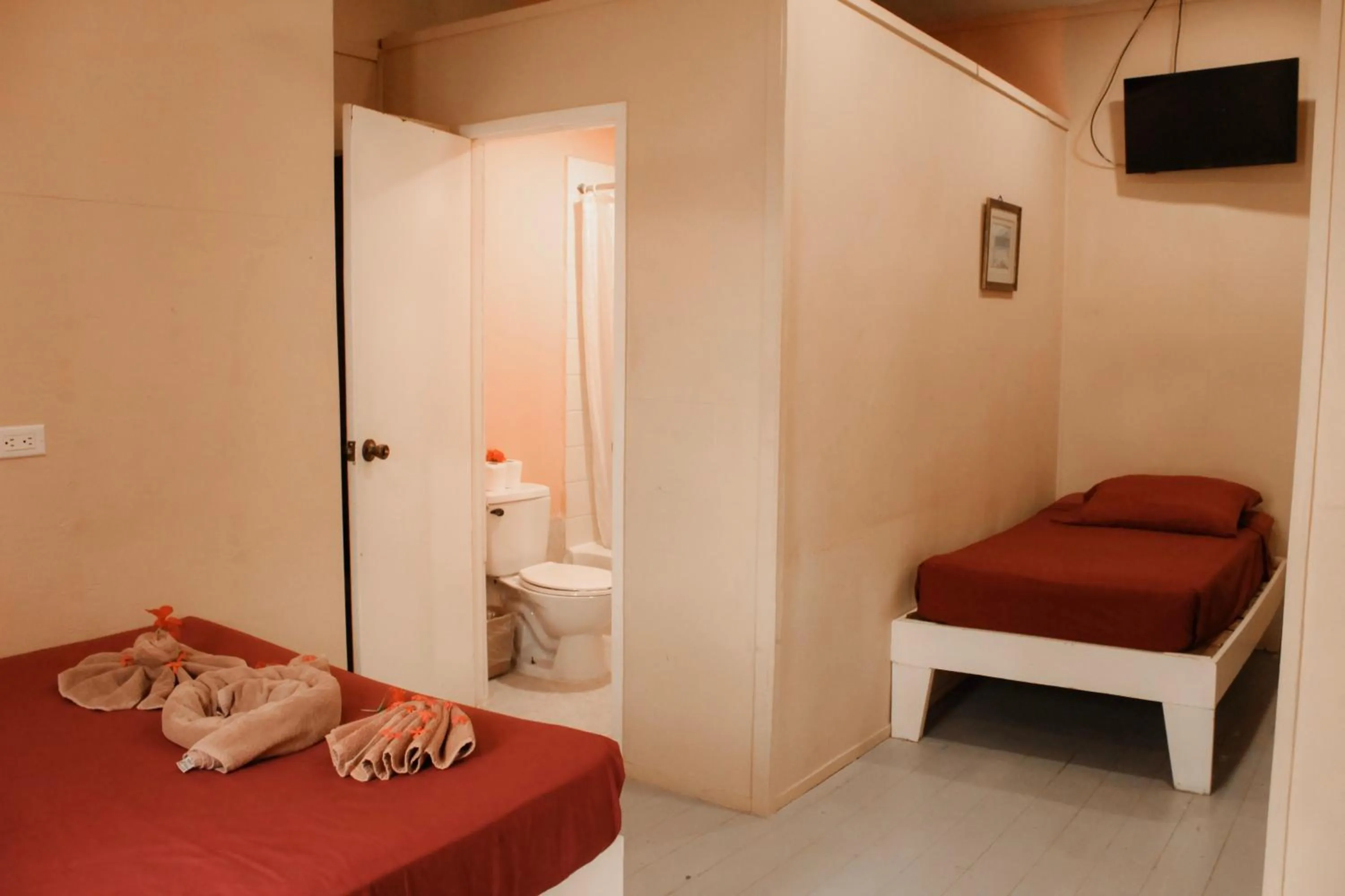 Toilet, Bed in Tropical Paradise Express