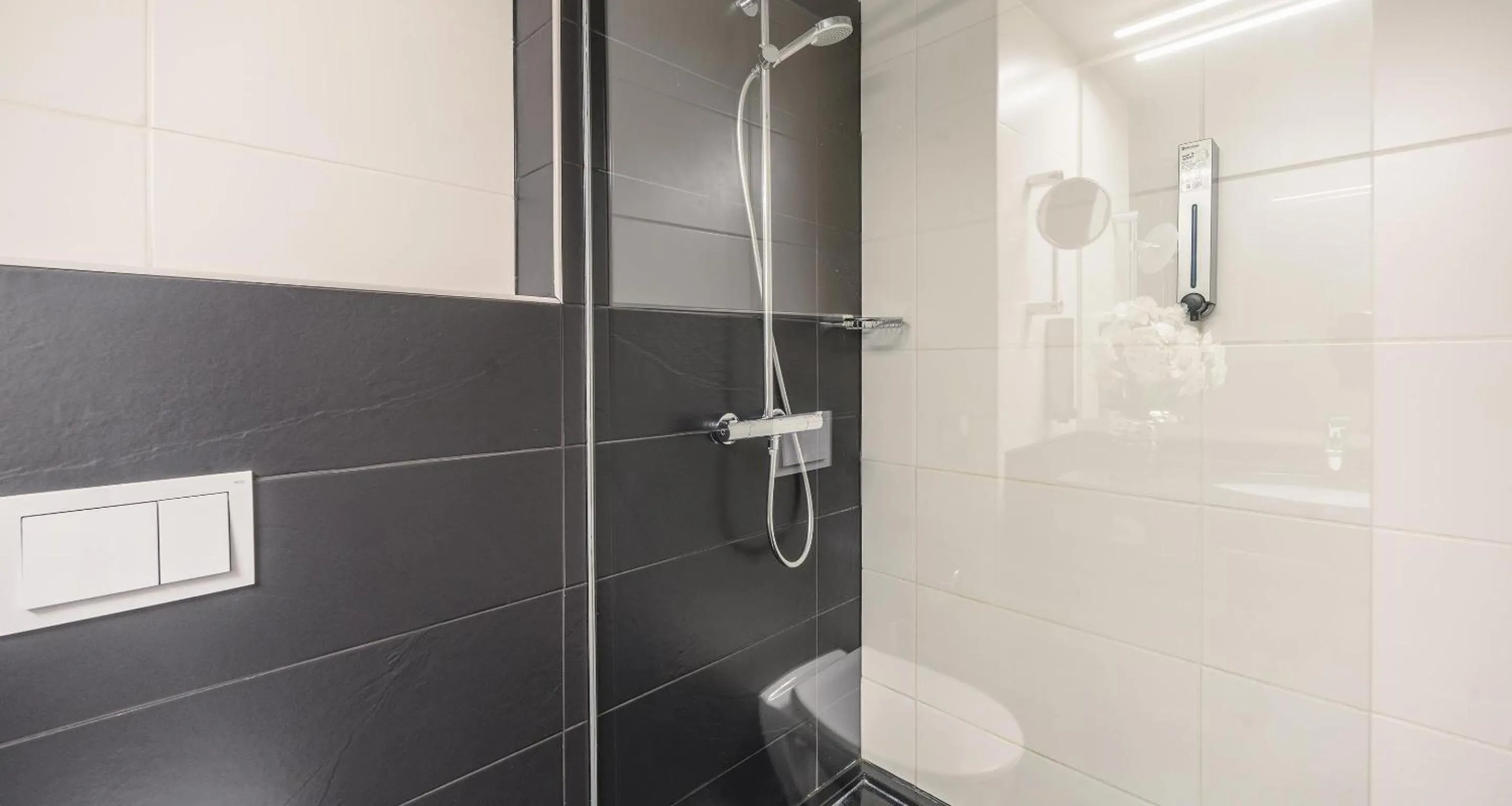 Bathroom in Best Western Plus Plaza Hotel Darmstadt