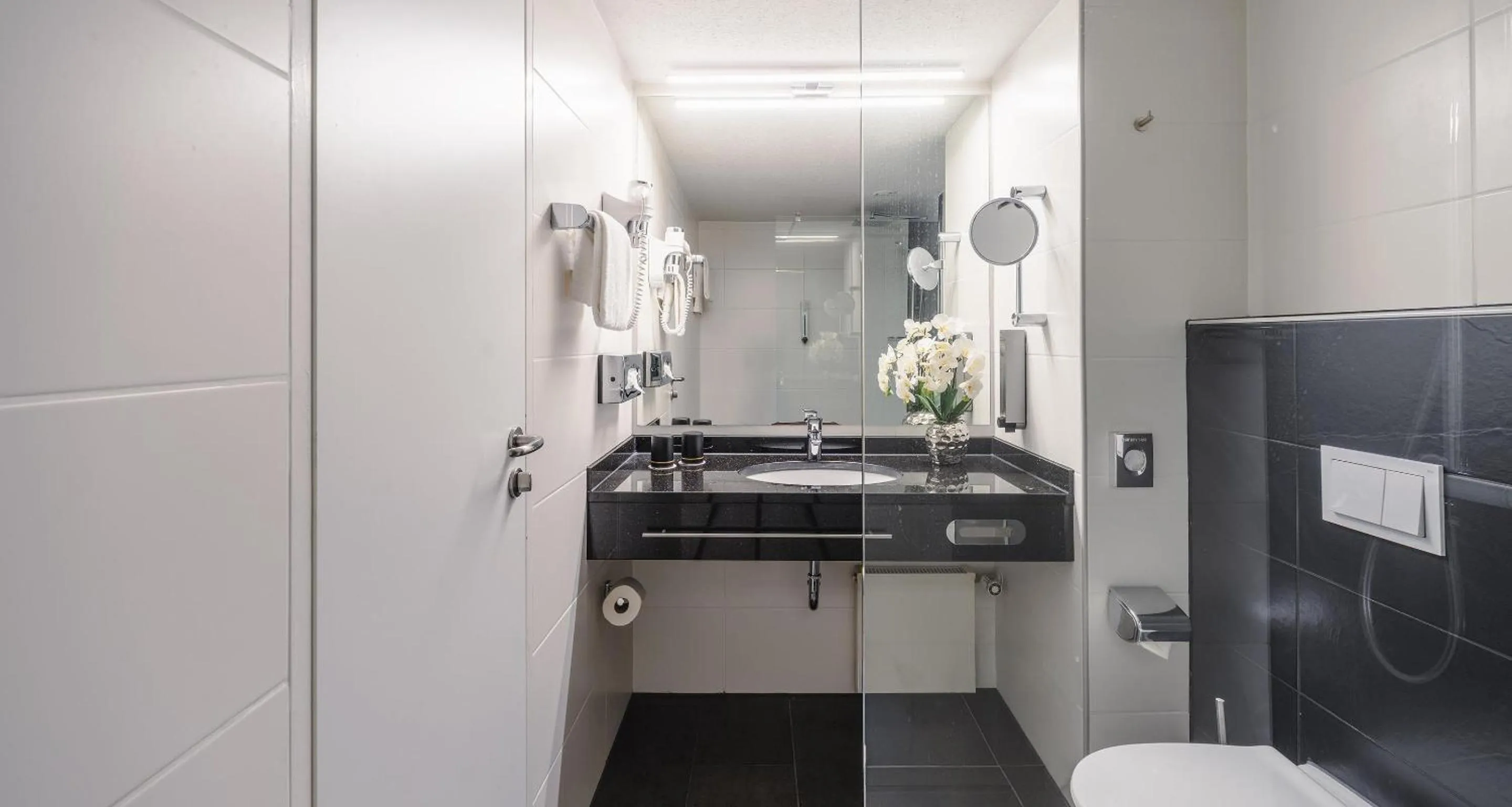 Bathroom in Best Western Plus Plaza Hotel Darmstadt