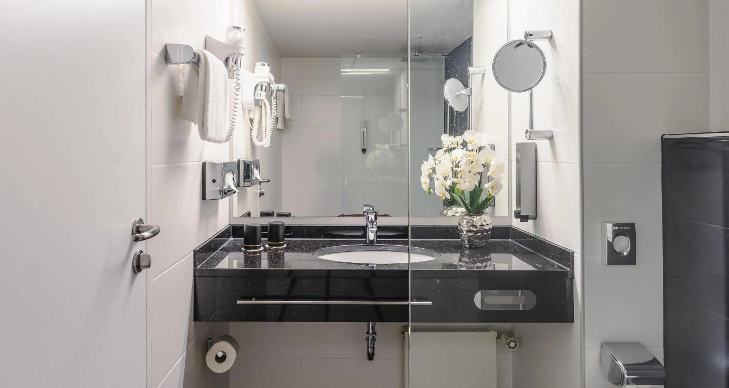 Bathroom in Best Western Plus Plaza Hotel Darmstadt