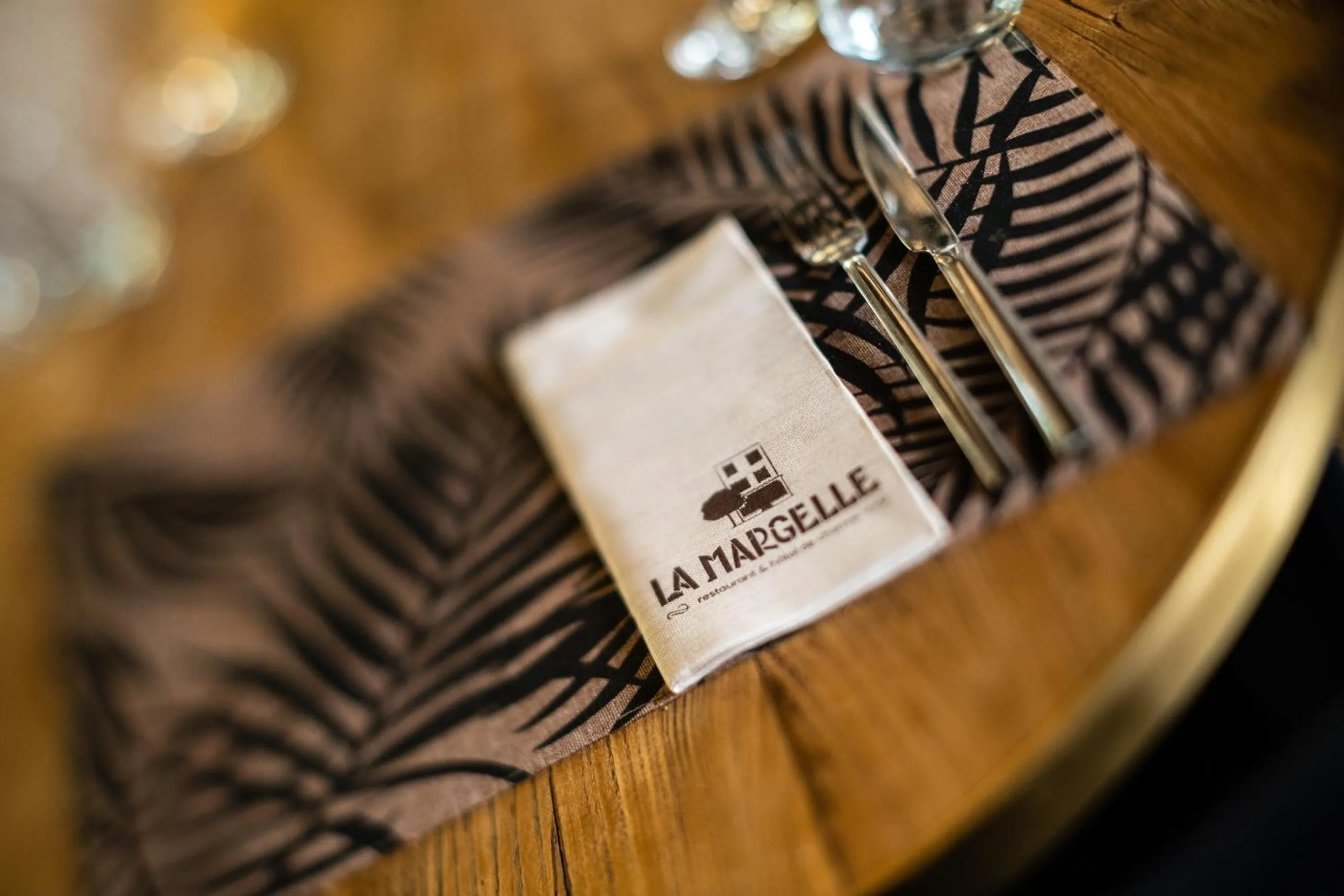 Property logo or sign in Hôtel LA MARGELLE