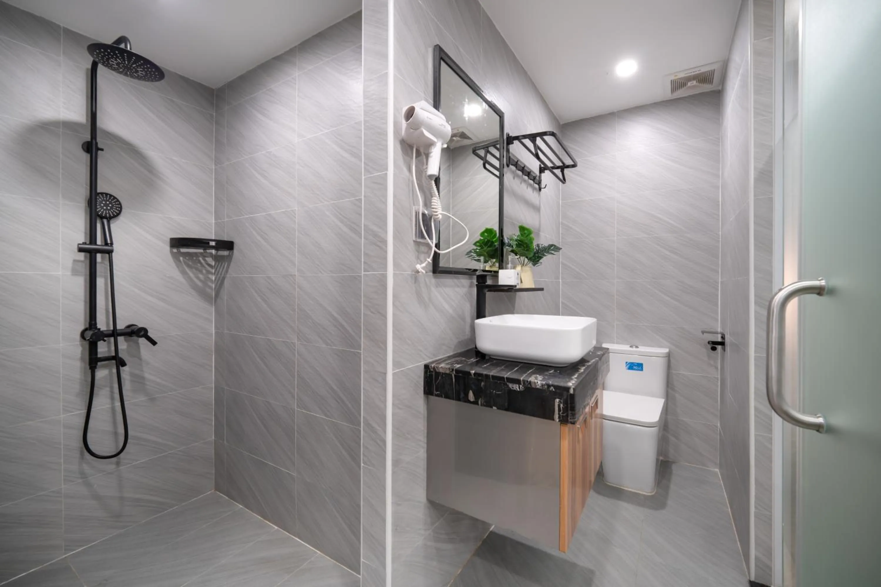 Shower in Mons Boutique Hotel & Apartment