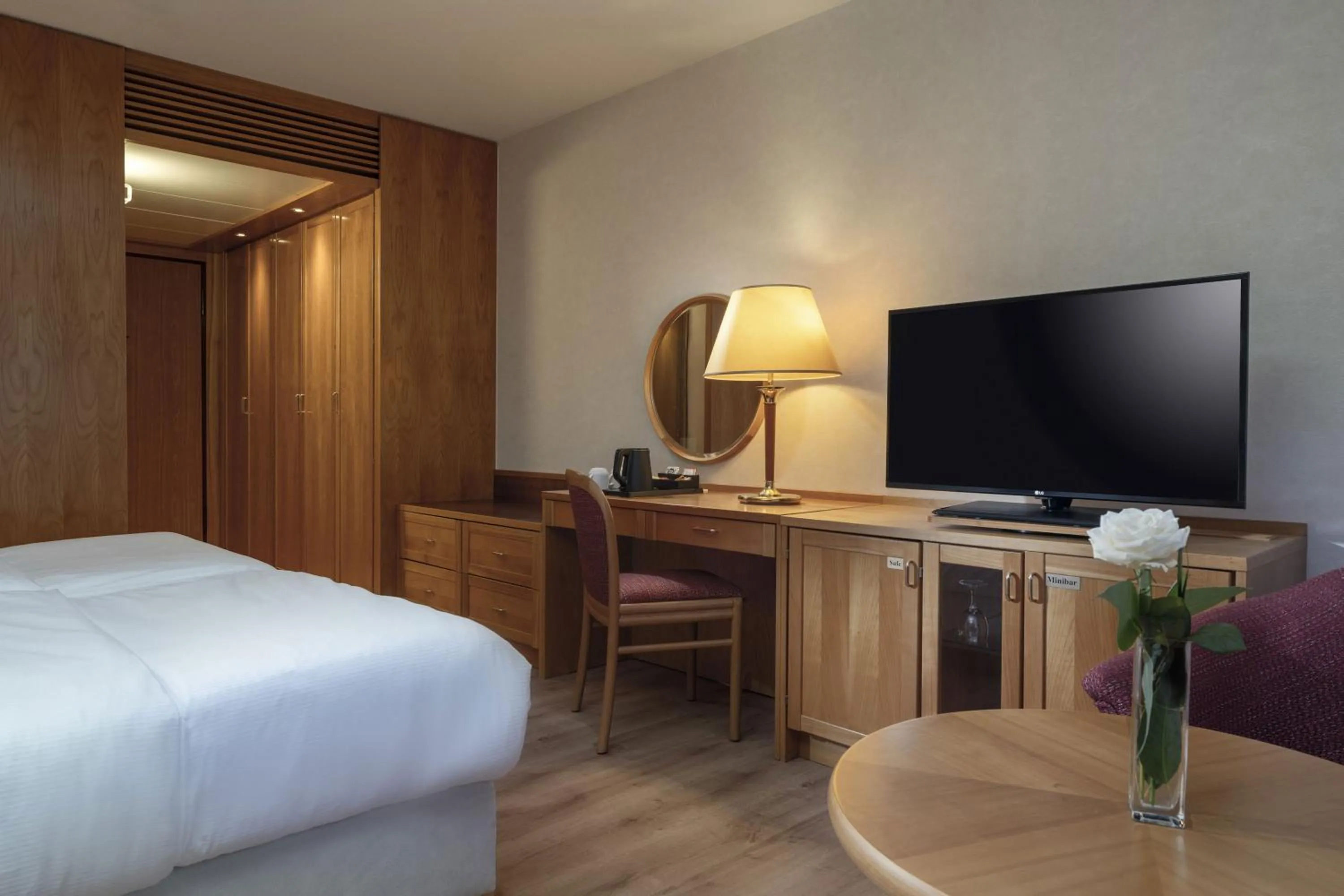 Photo of the whole room, Bed in Maritim Hotel Magdeburg