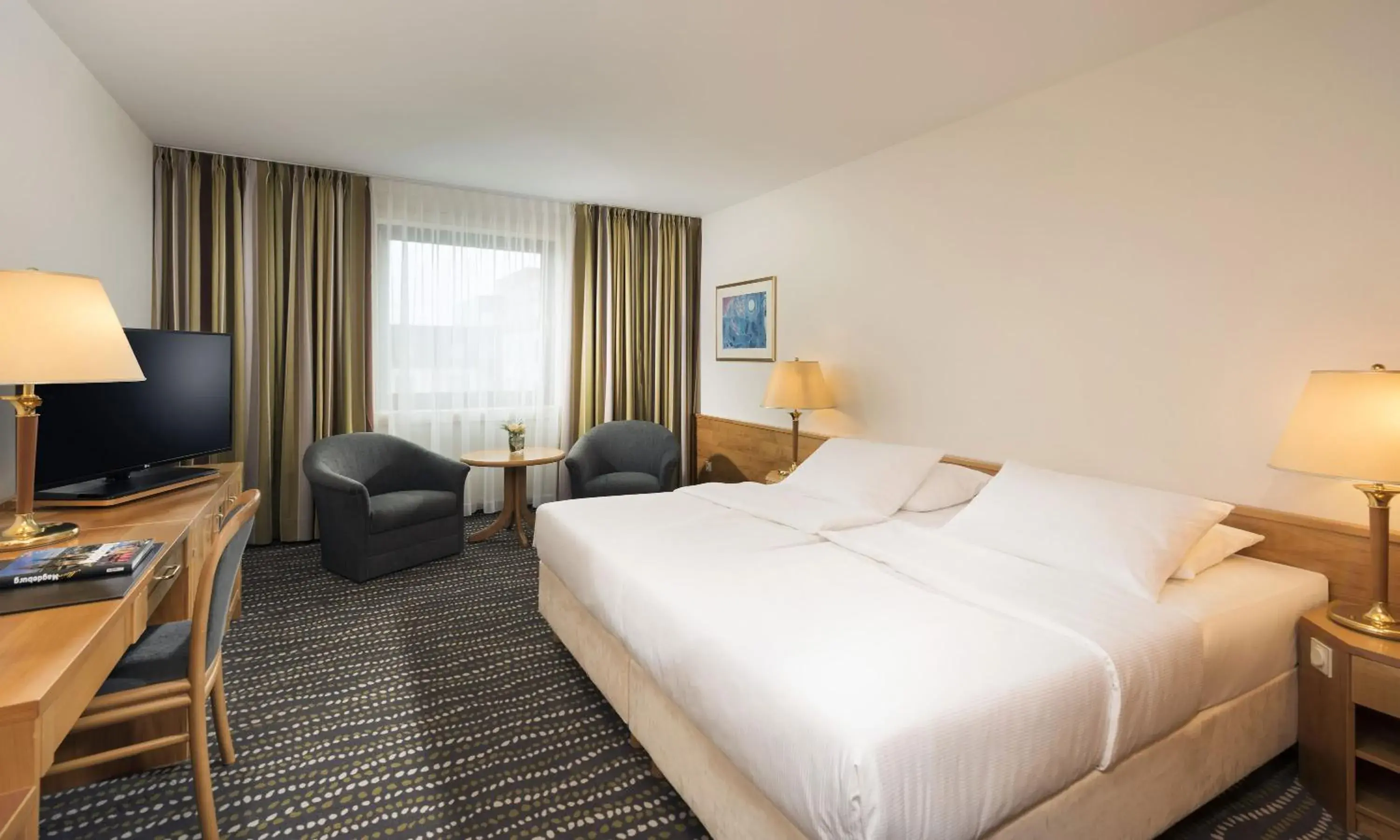 Photo of the whole room, Bed in Maritim Hotel Magdeburg Photo of the whole room, Bed in Maritim Hotel Magdeburg