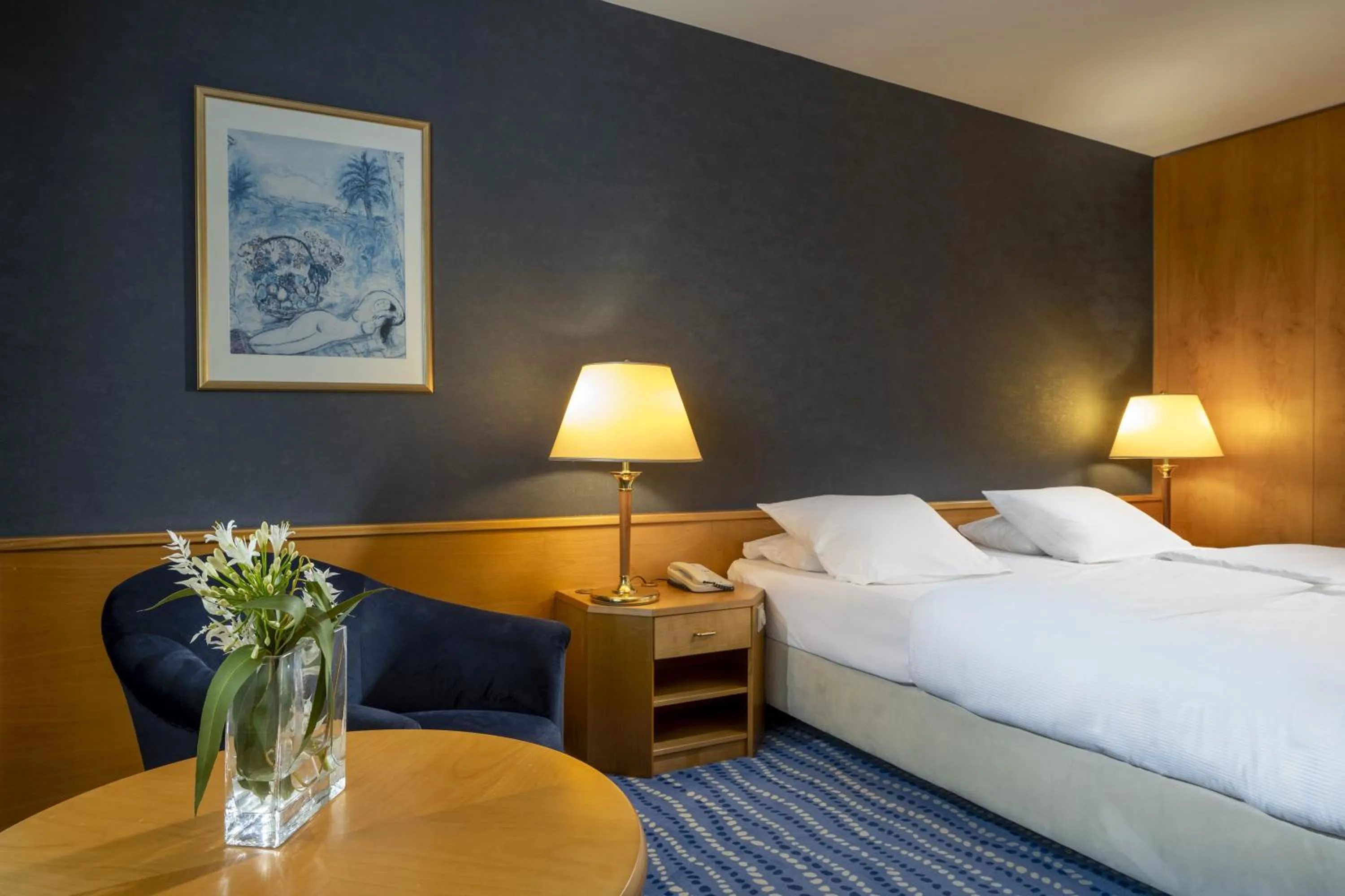 Photo of the whole room, Bed in Maritim Hotel Magdeburg