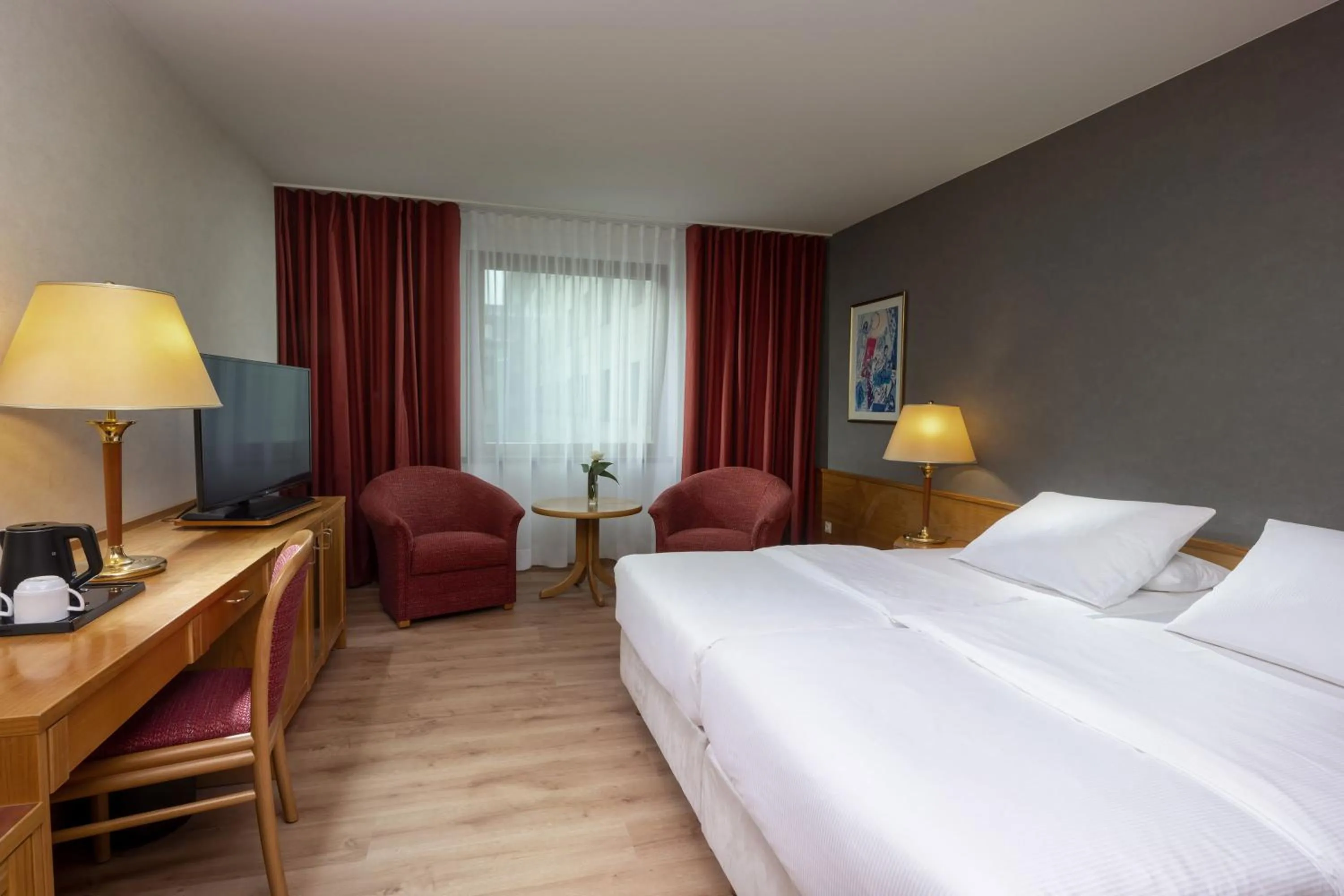 Photo of the whole room, Bed in Maritim Hotel Magdeburg