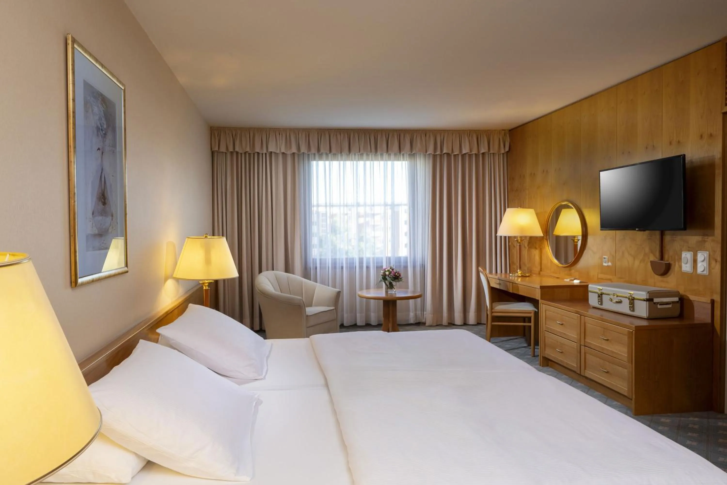 Photo of the whole room, Bed in Maritim Hotel Magdeburg