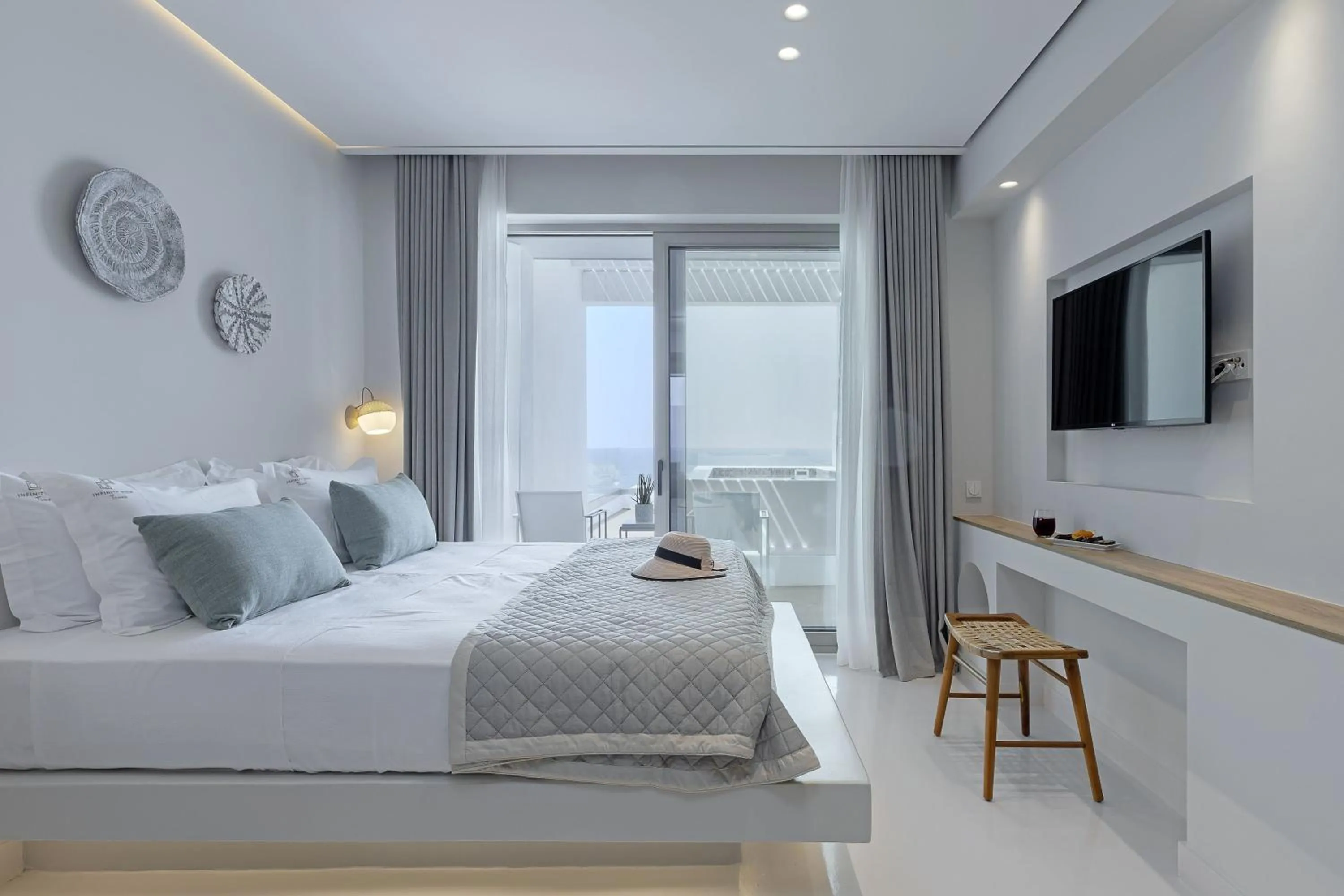 Bed in Infinity View Hotel Tinos