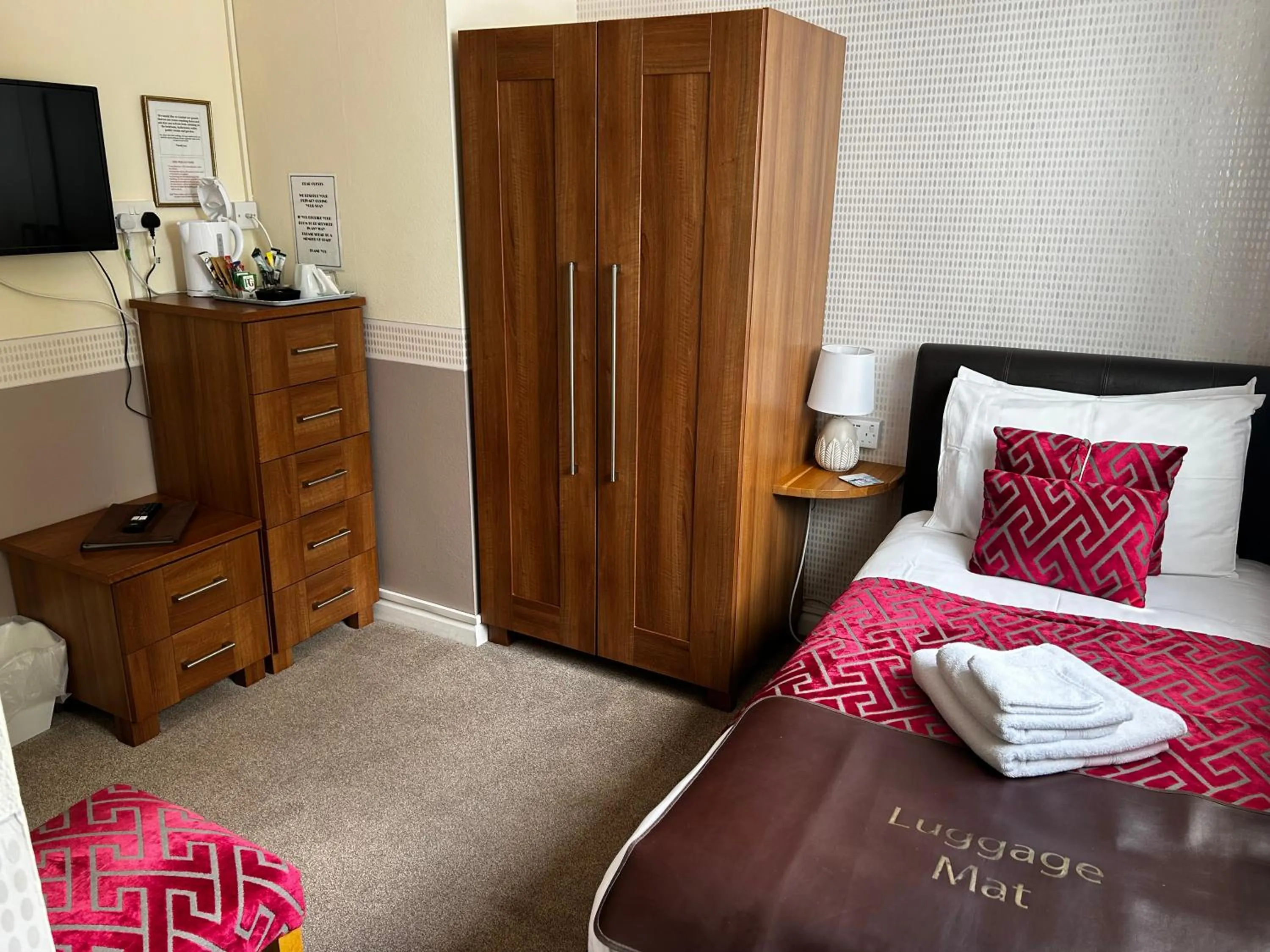 Bed in amber house hotel