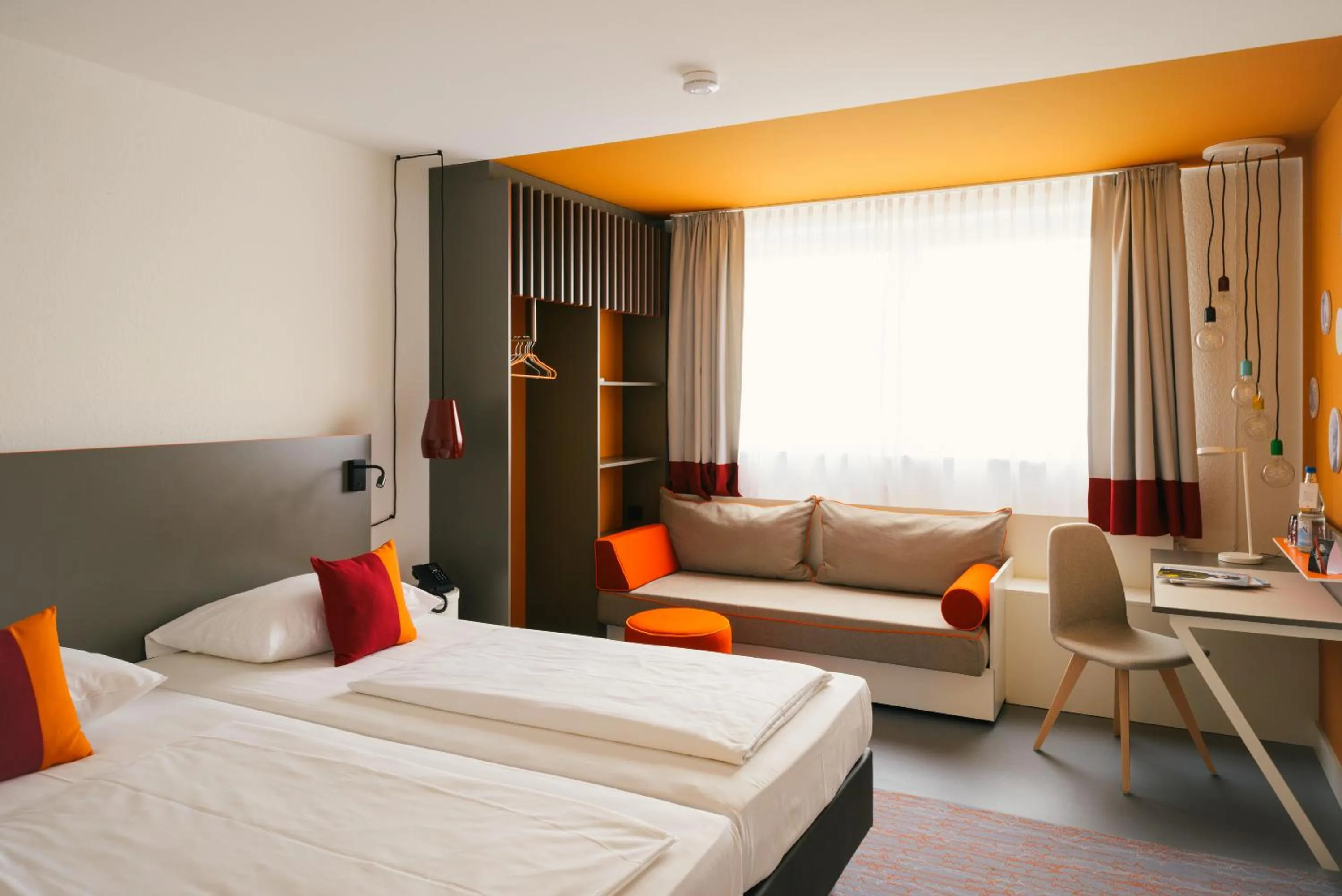 Photo of the whole room, Bed in Vienna House Easy by Wyndham Neckarsulm