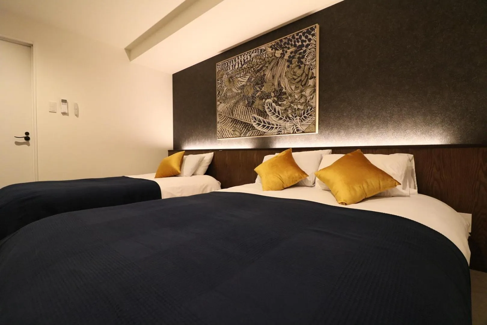 Bed in TAKETO STAY Kotoni