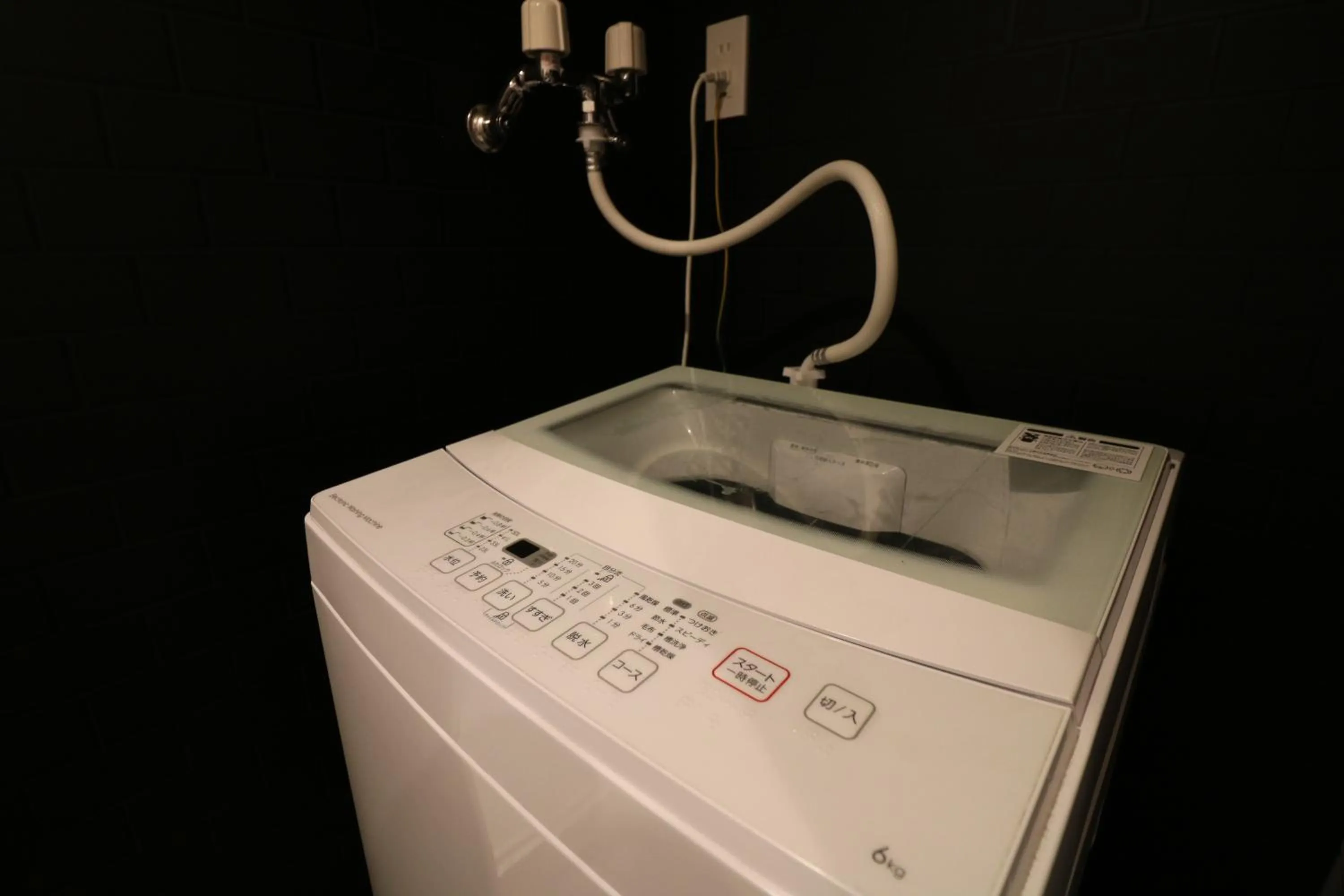 laundry in TAKETO STAY Kotoni