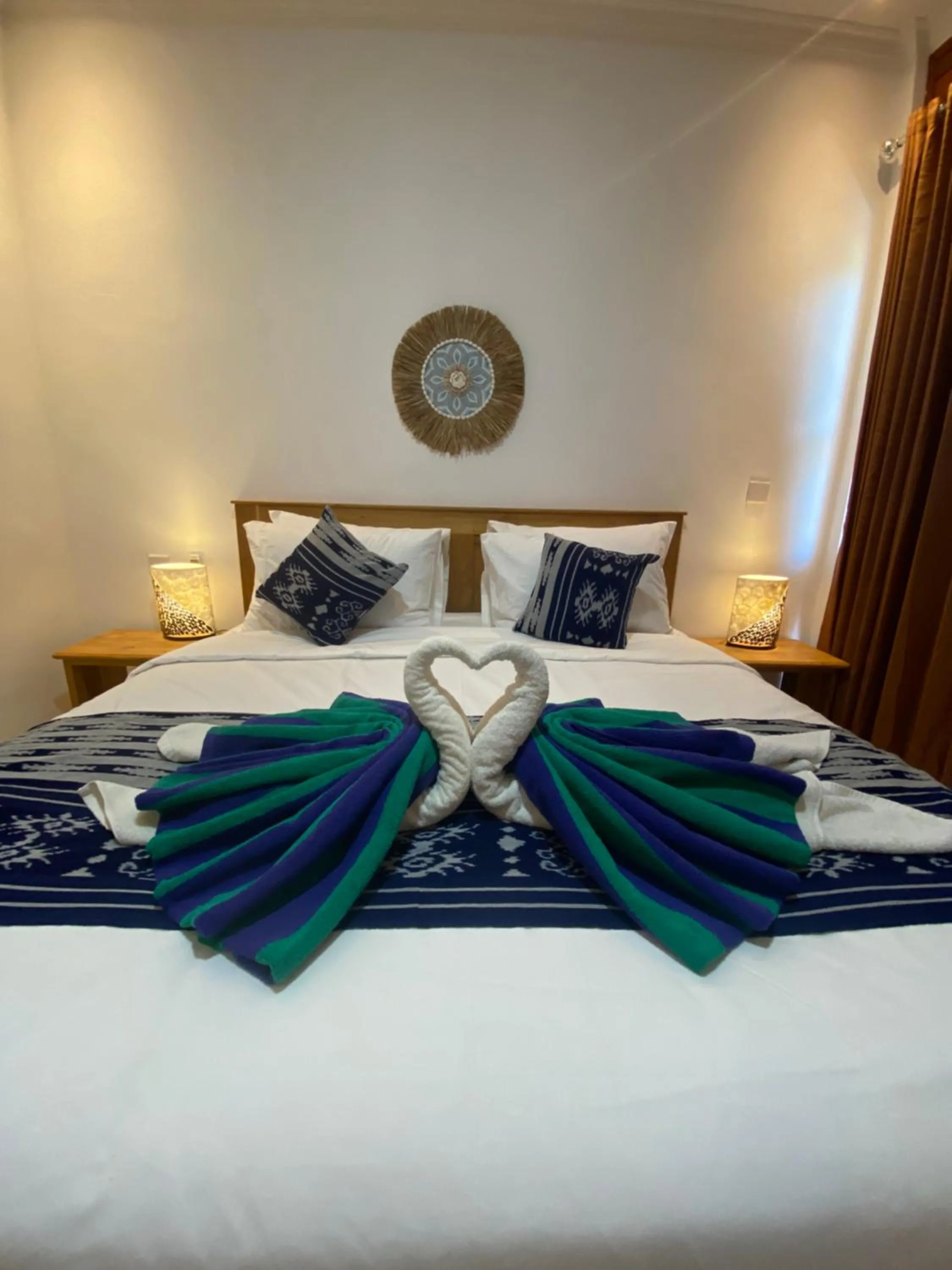 Bed in The Pulau Bungalow