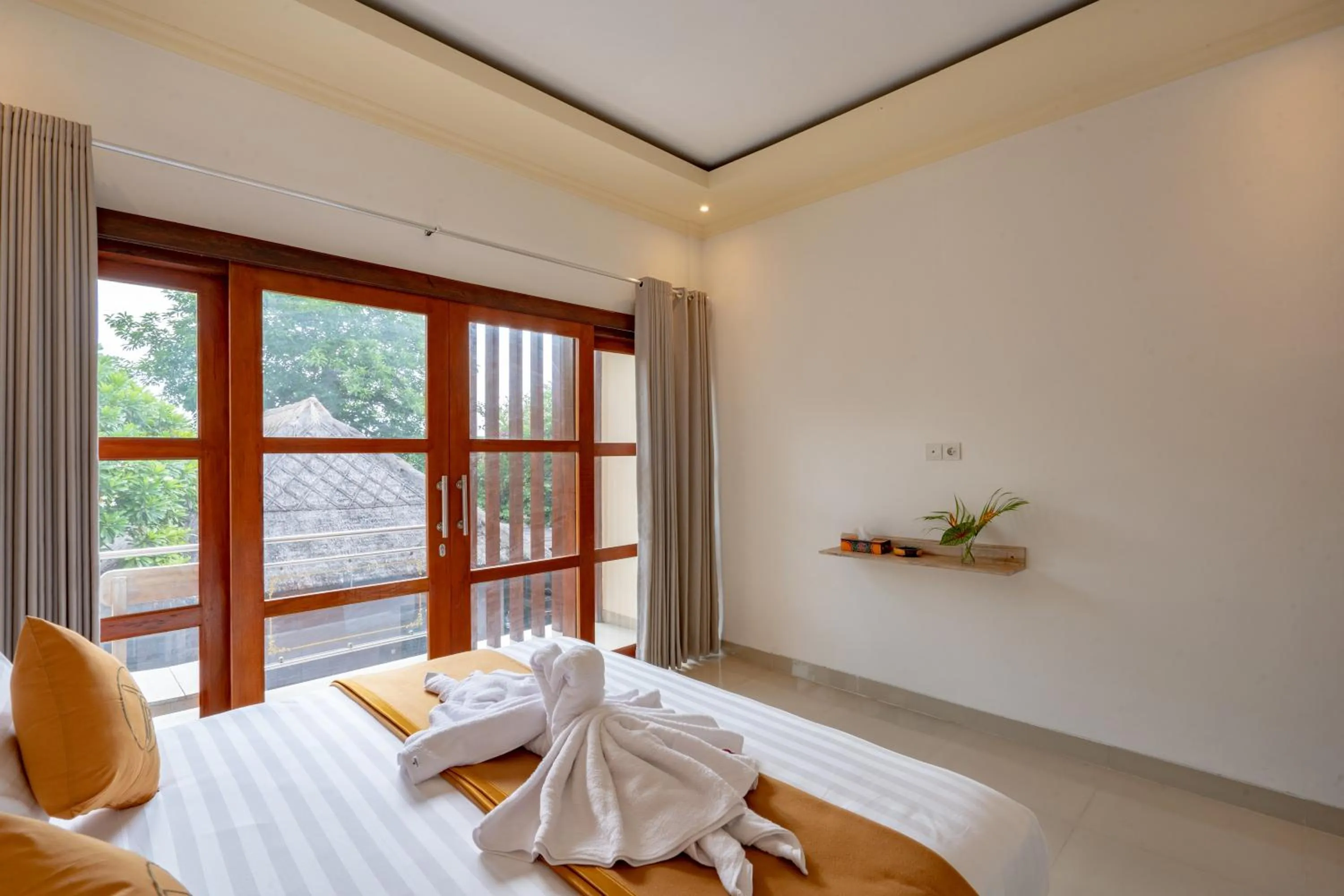 Bed in The Pulau Bungalow