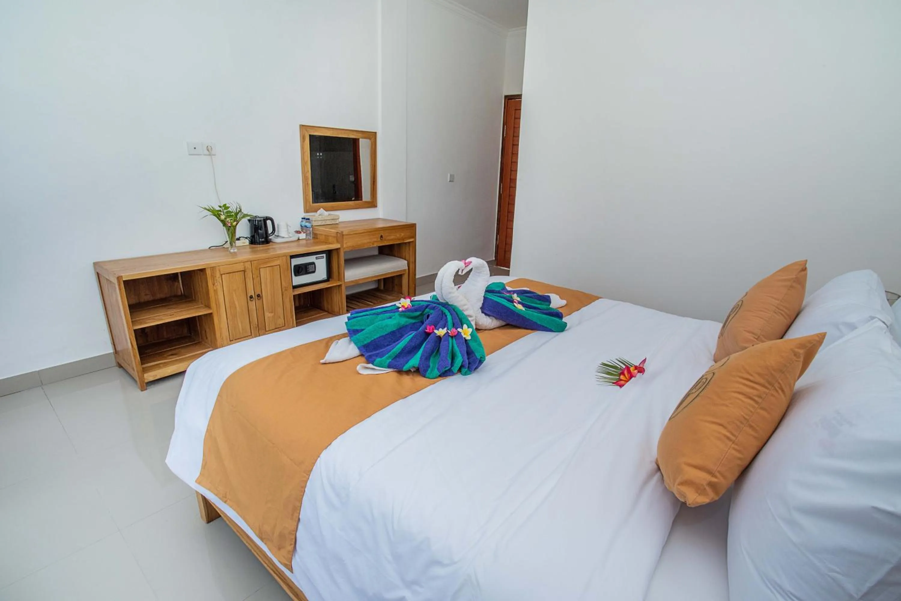 Bed in The Pulau Bungalow