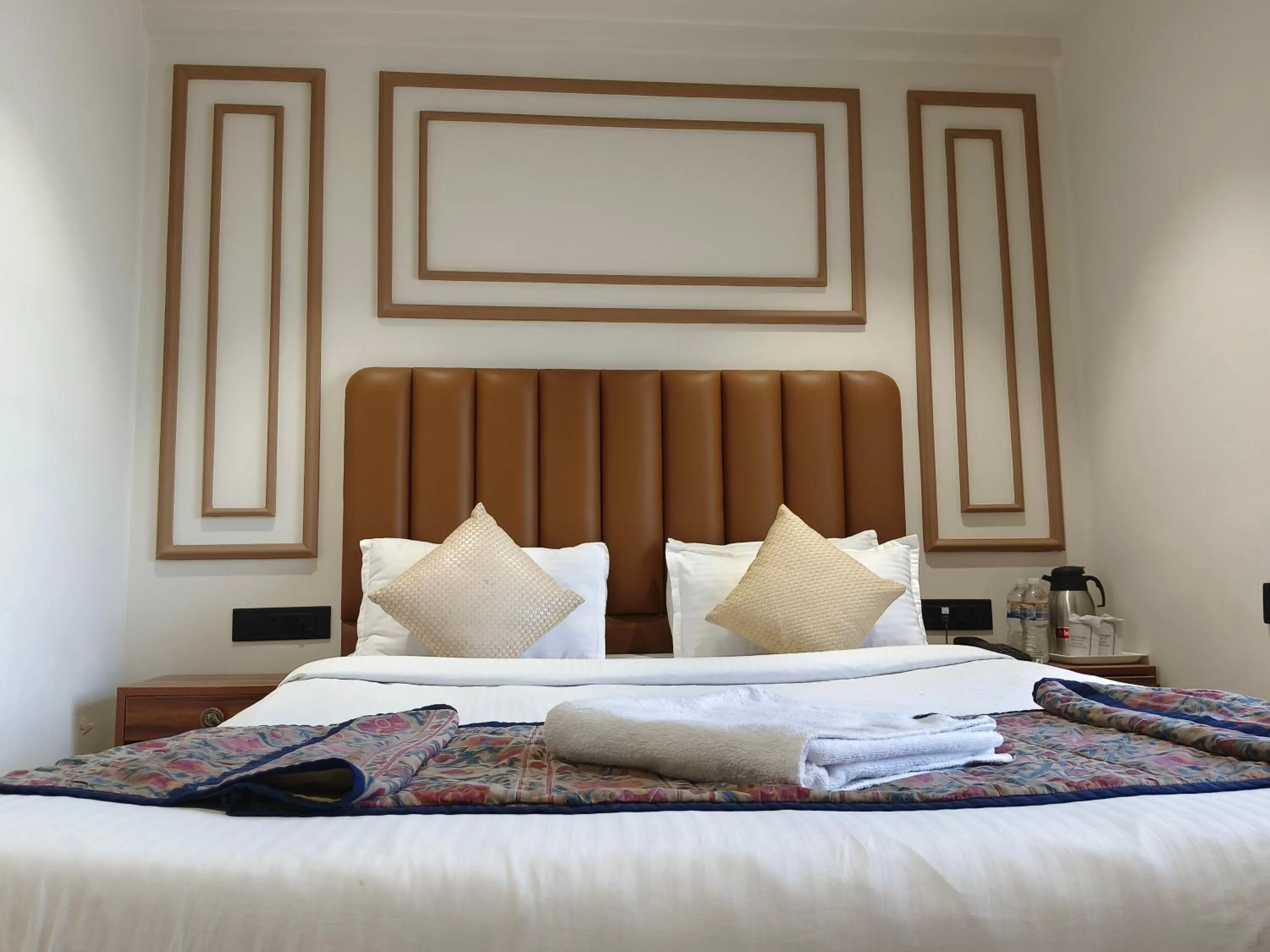 Bed in Hotel Ganpati Palace