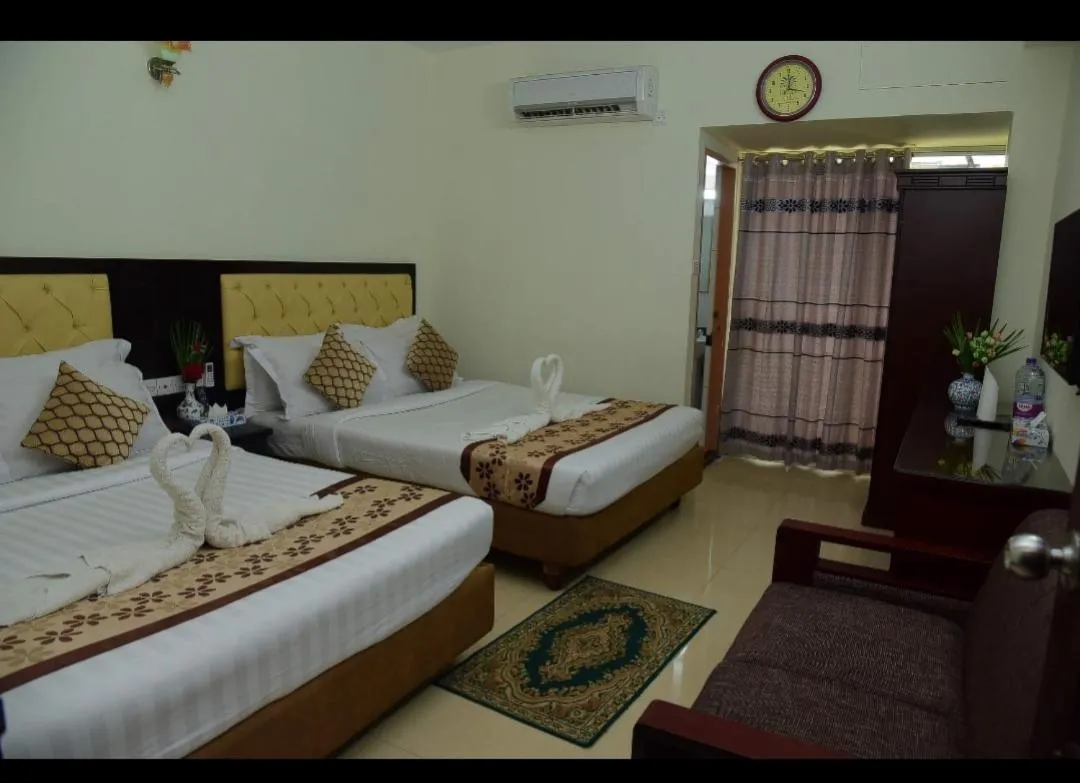 Bed in Hotel Regal Palace