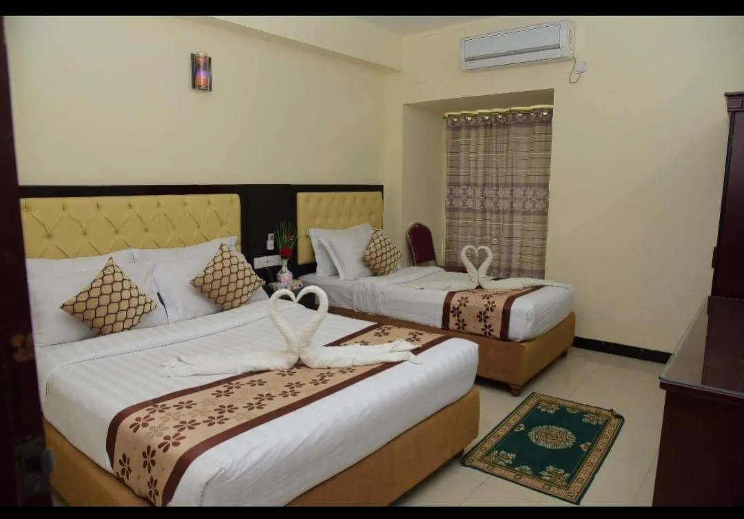 Bed in Hotel Regal Palace