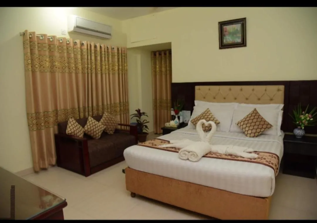 Bed in Hotel Regal Palace