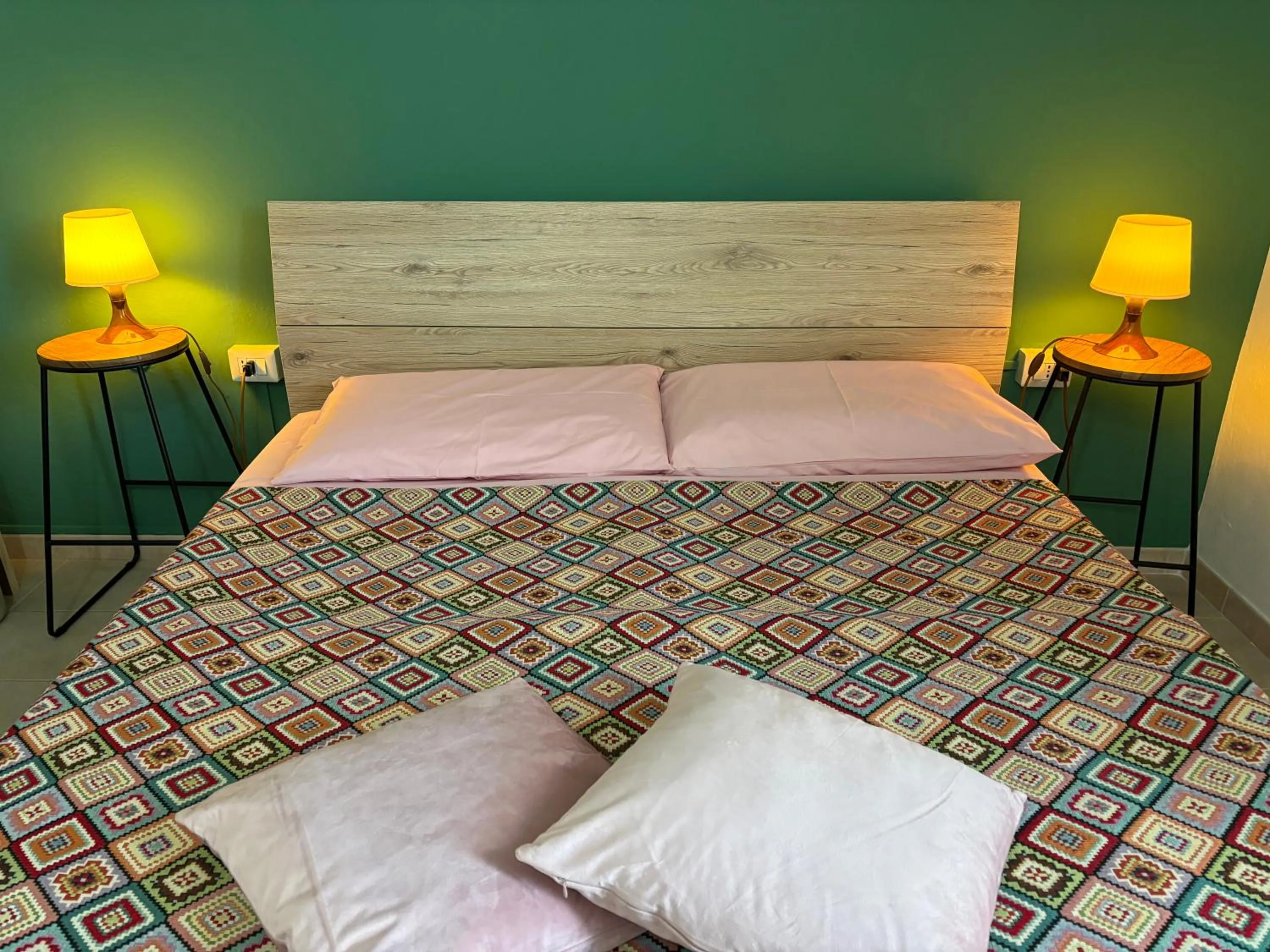 Bed in Assajè Guestroom