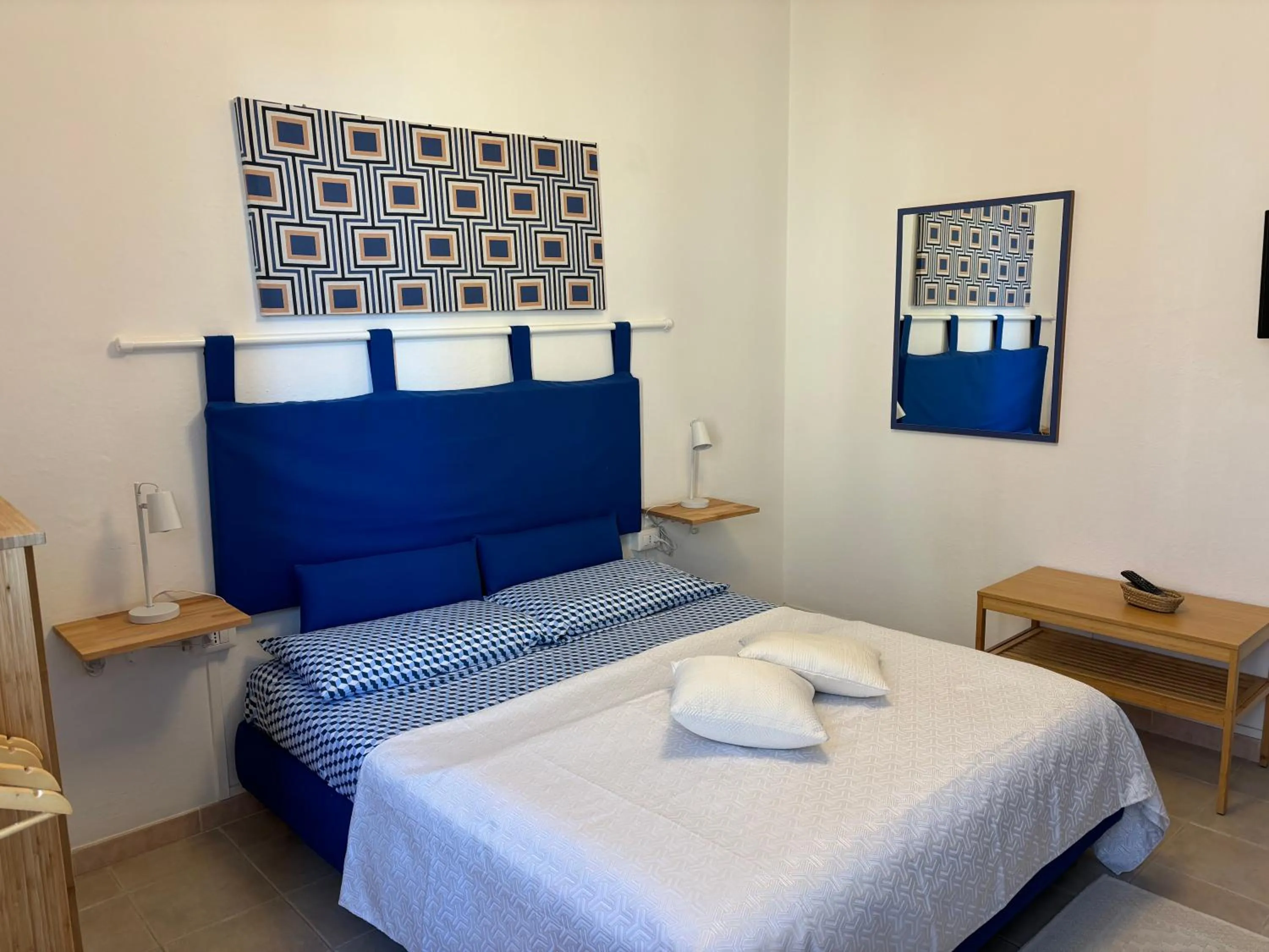 Bed in Assajè Guestroom