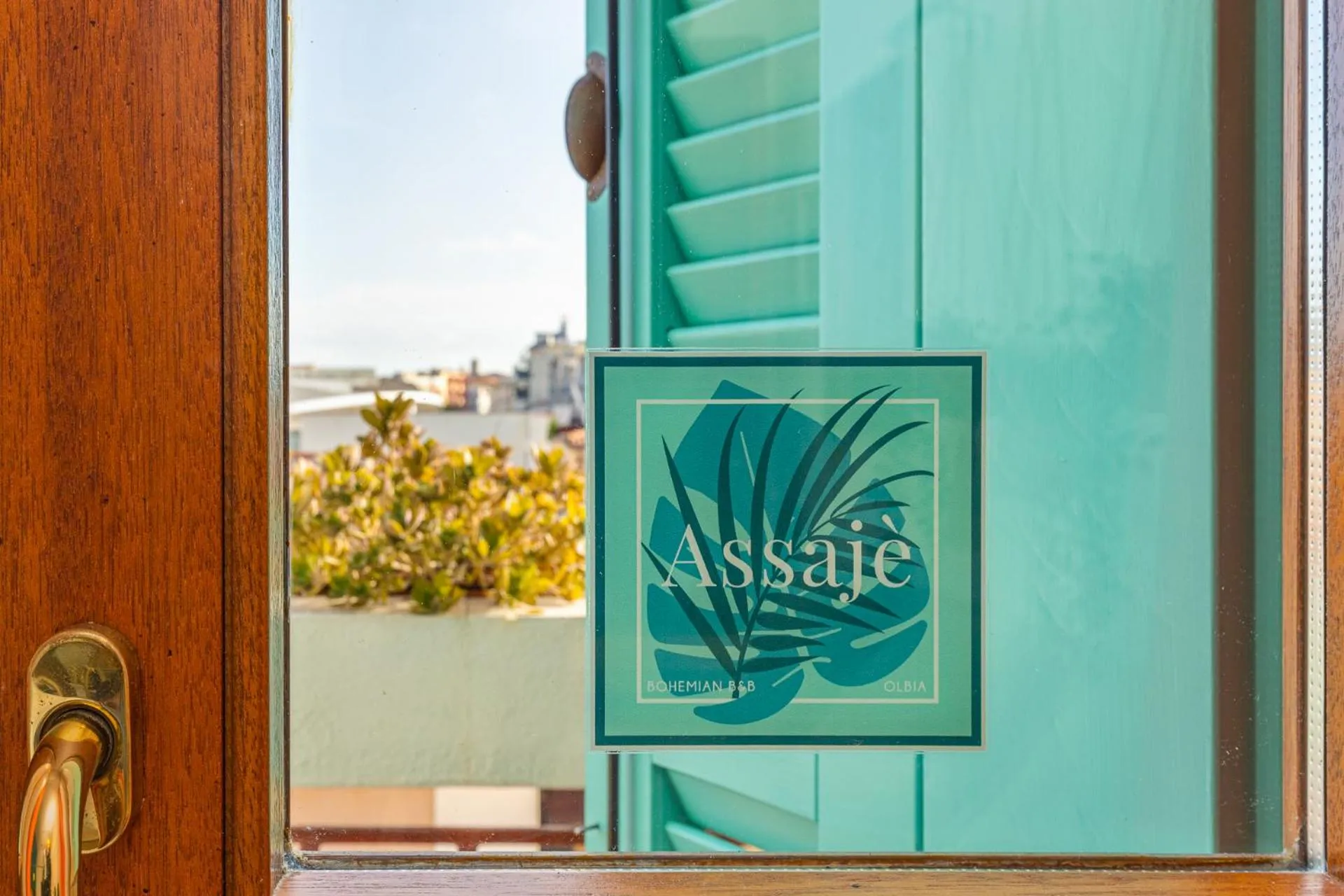 Property logo or sign in Assajè Guestroom