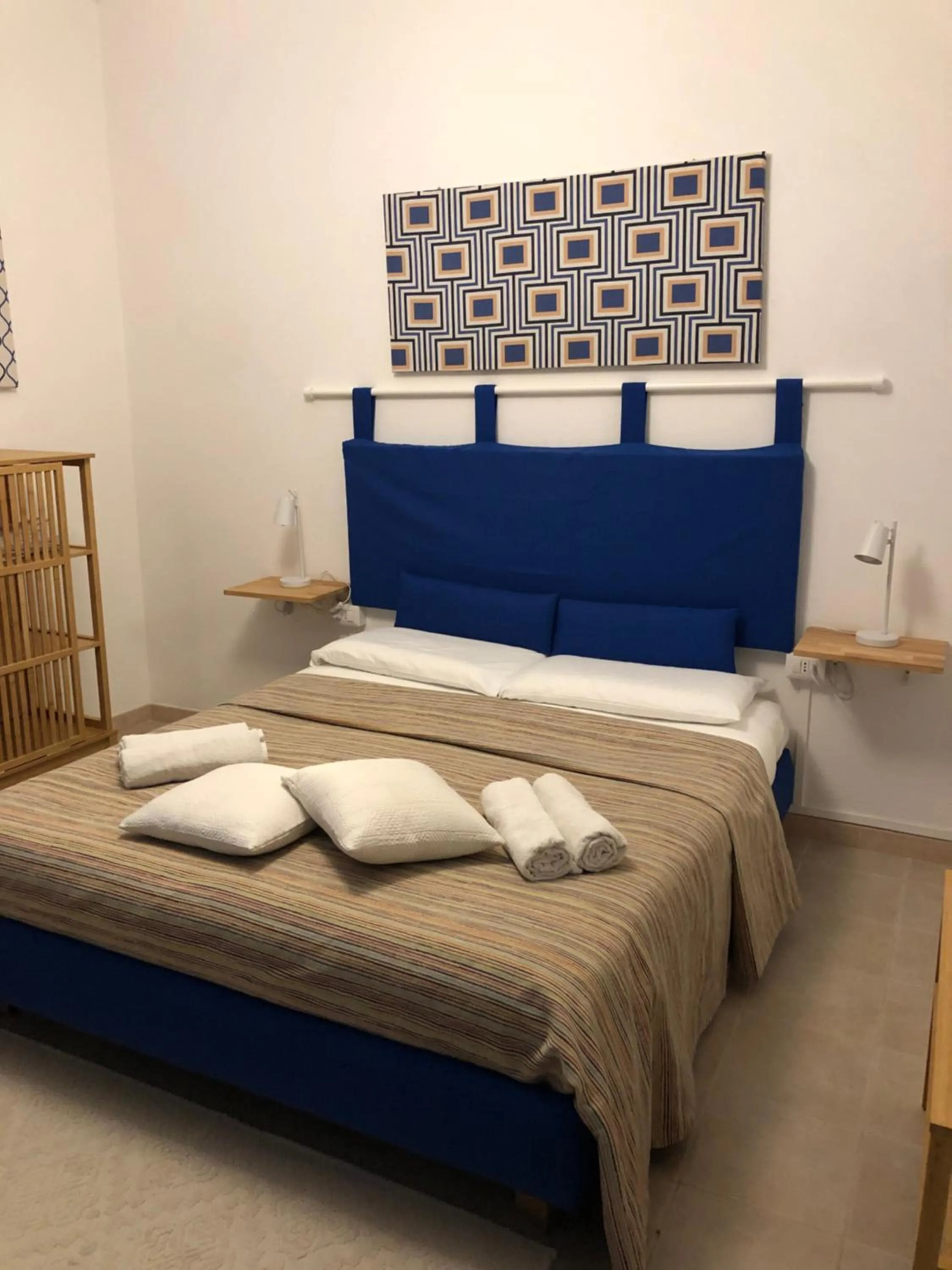 Bed in Assajè Guestroom