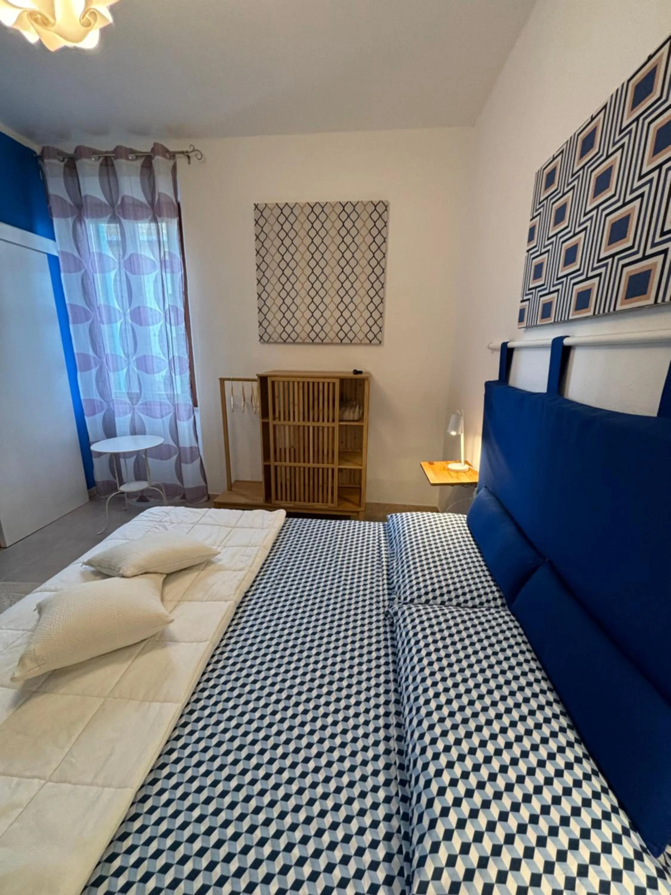 Bed in Assajè Guestroom