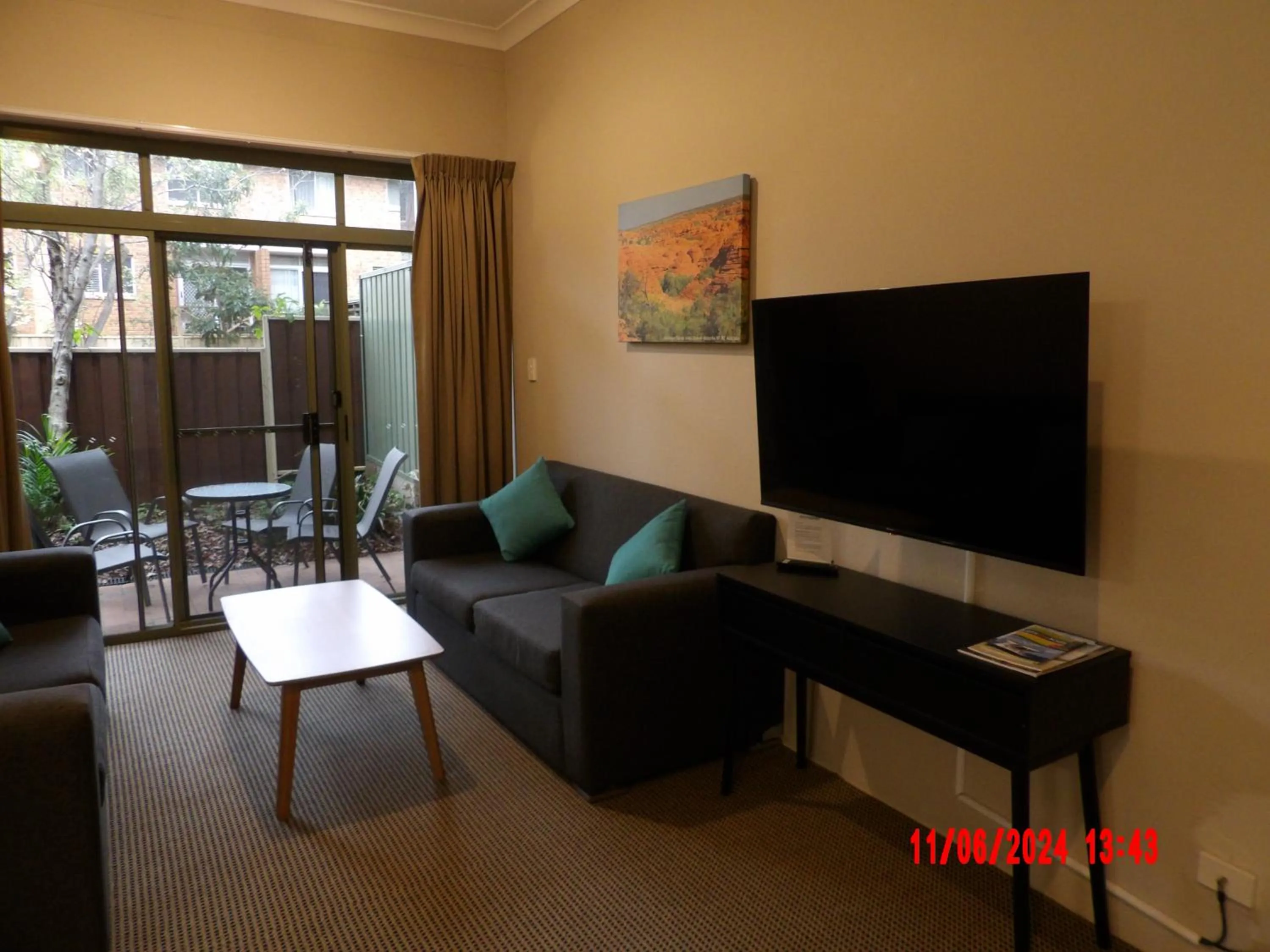 Living room in The Belmore Apartments Hotel