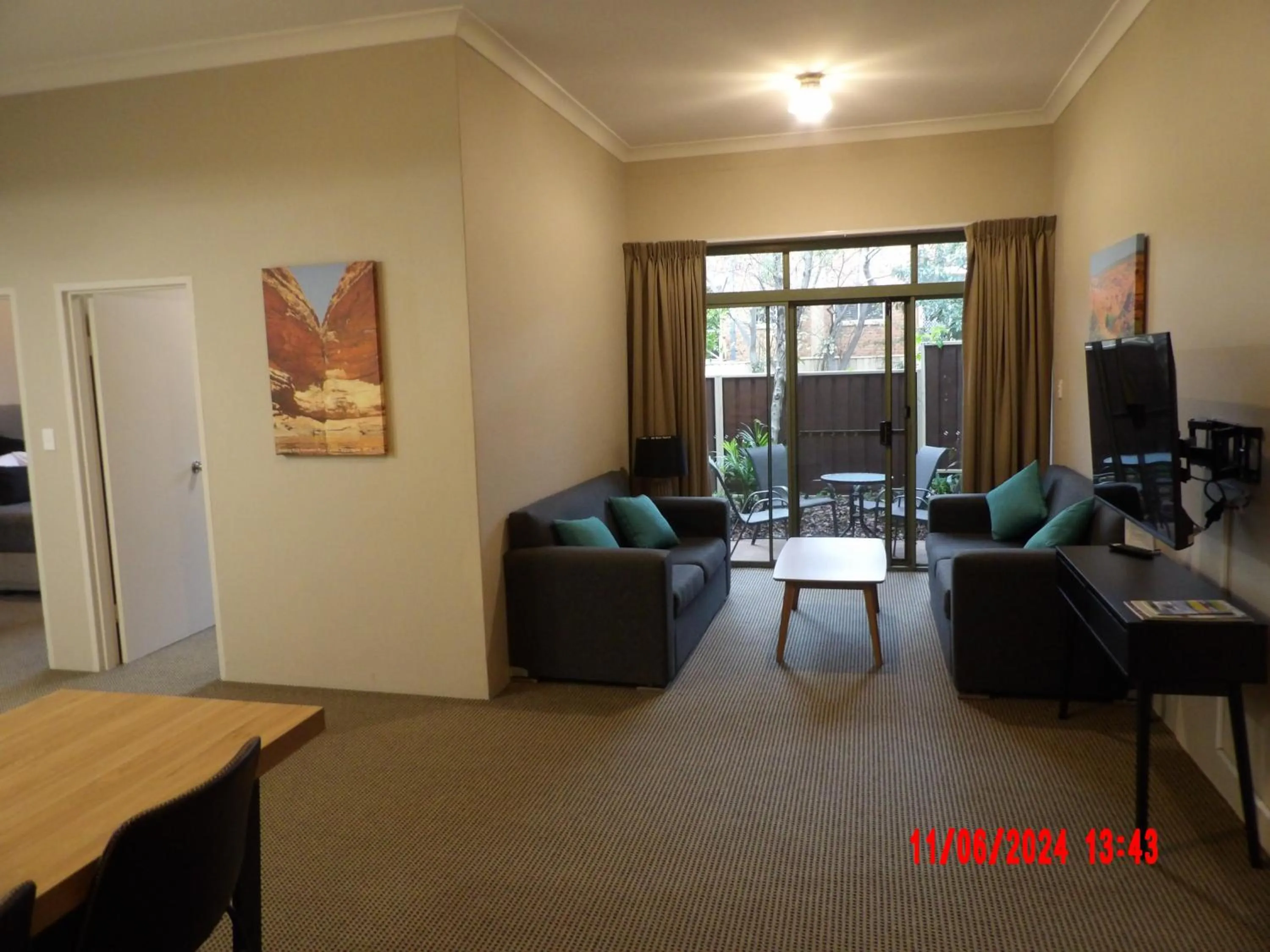Living room in The Belmore Apartments Hotel
