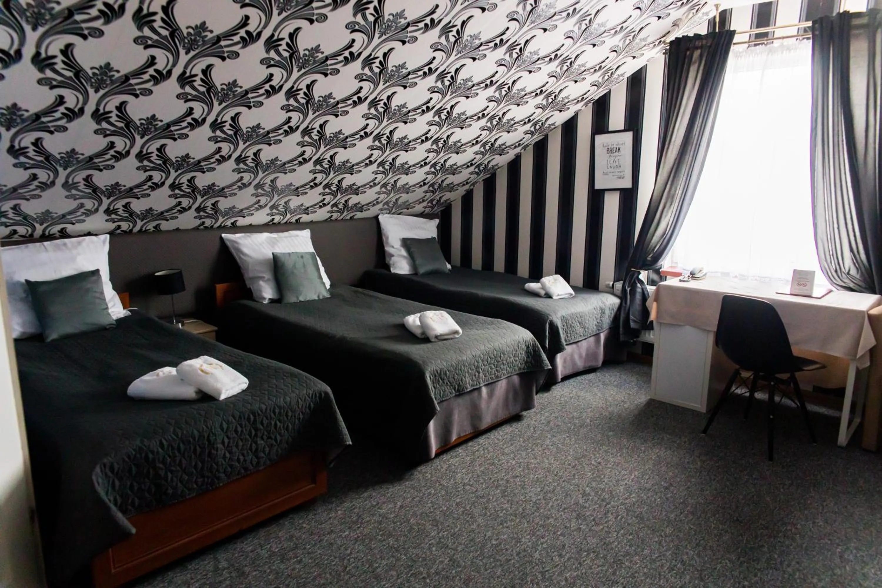 Bed in Hotel Napoleon