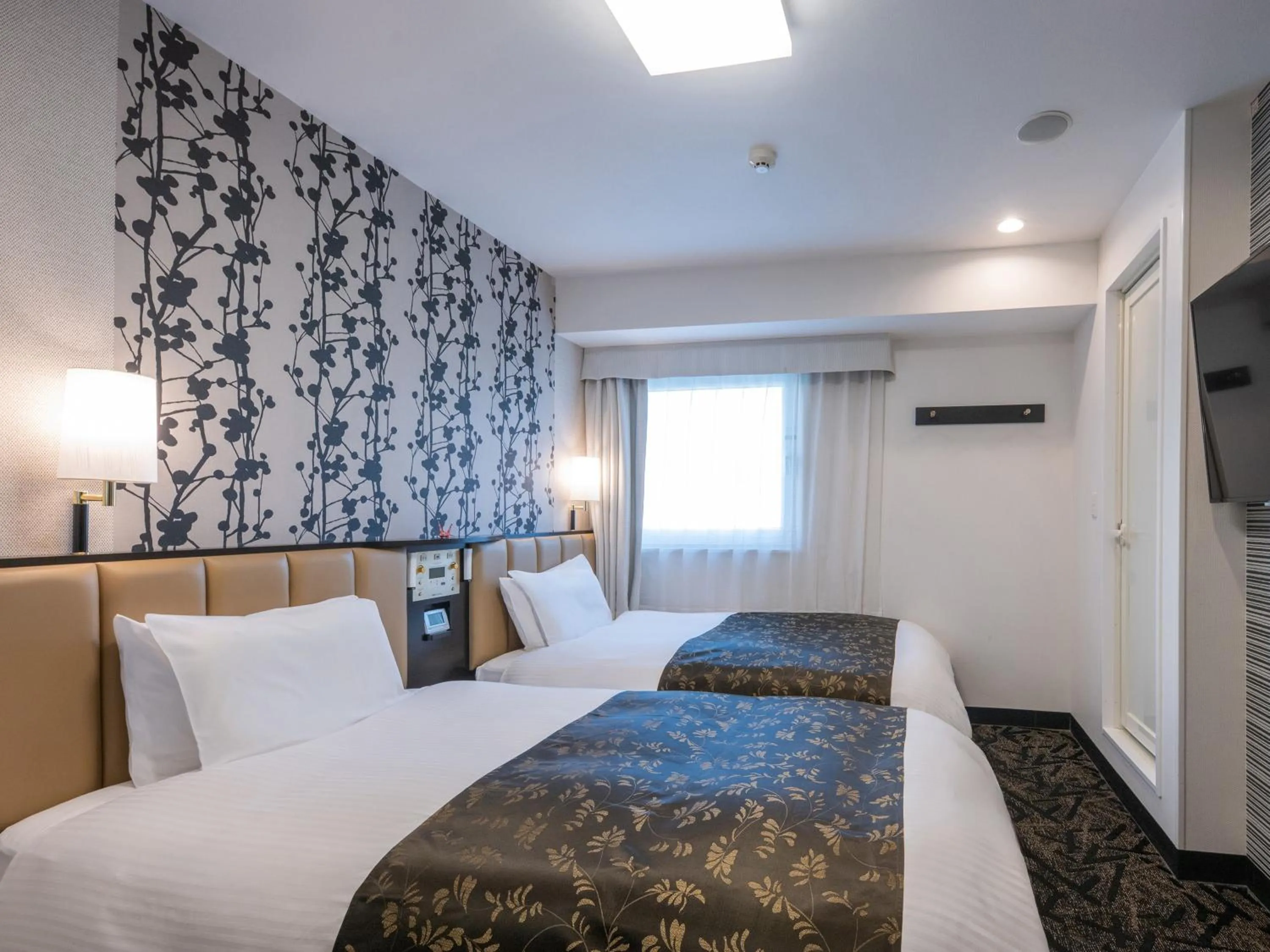 Photo of the whole room, Bed in APA Hotel Nagoya Ekimae Minami