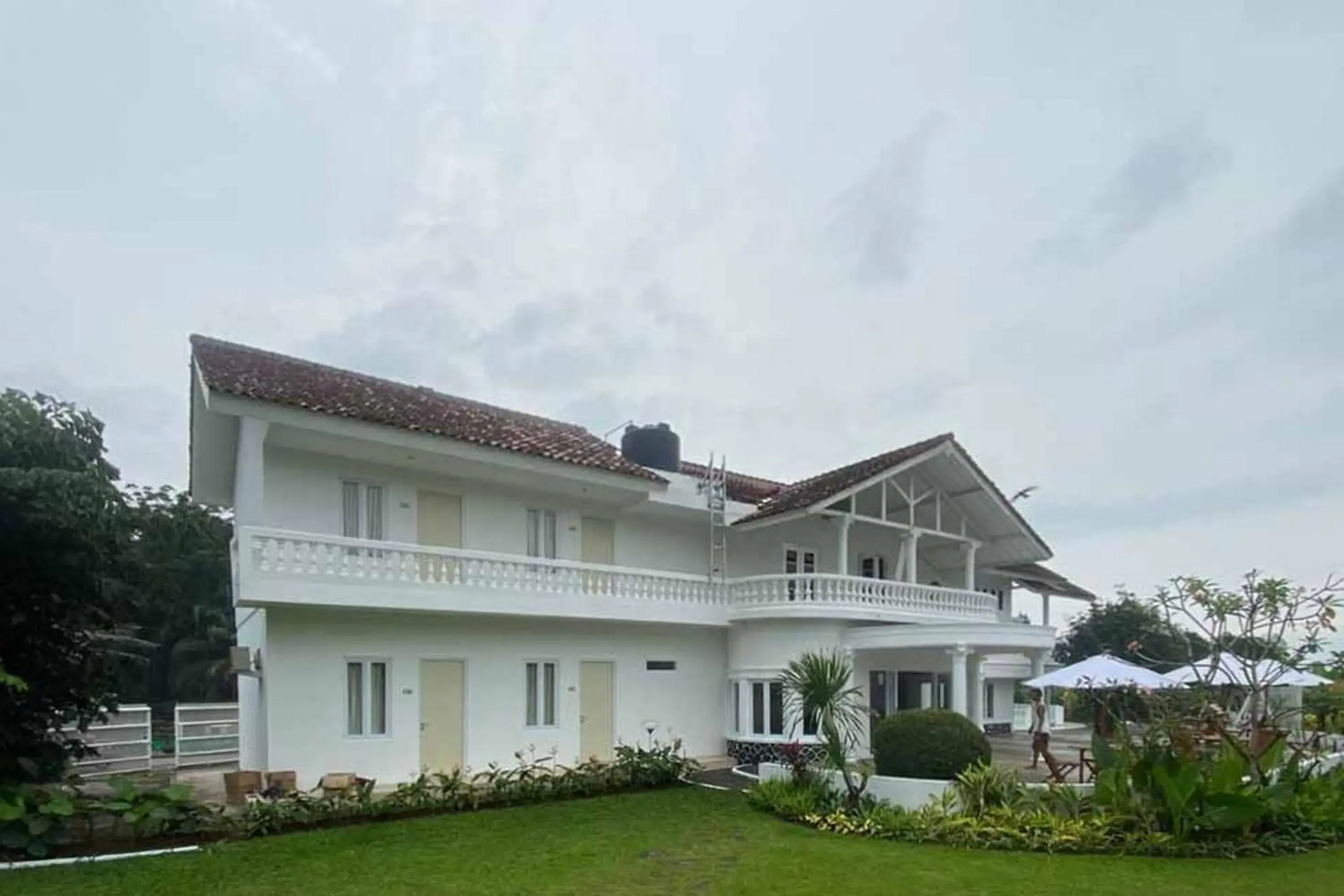 Property logo or sign in RedDoorz Plus @ Megamendung Puncak 2 Property logo or sign in RedDoorz Plus @ Megamendung Puncak 2