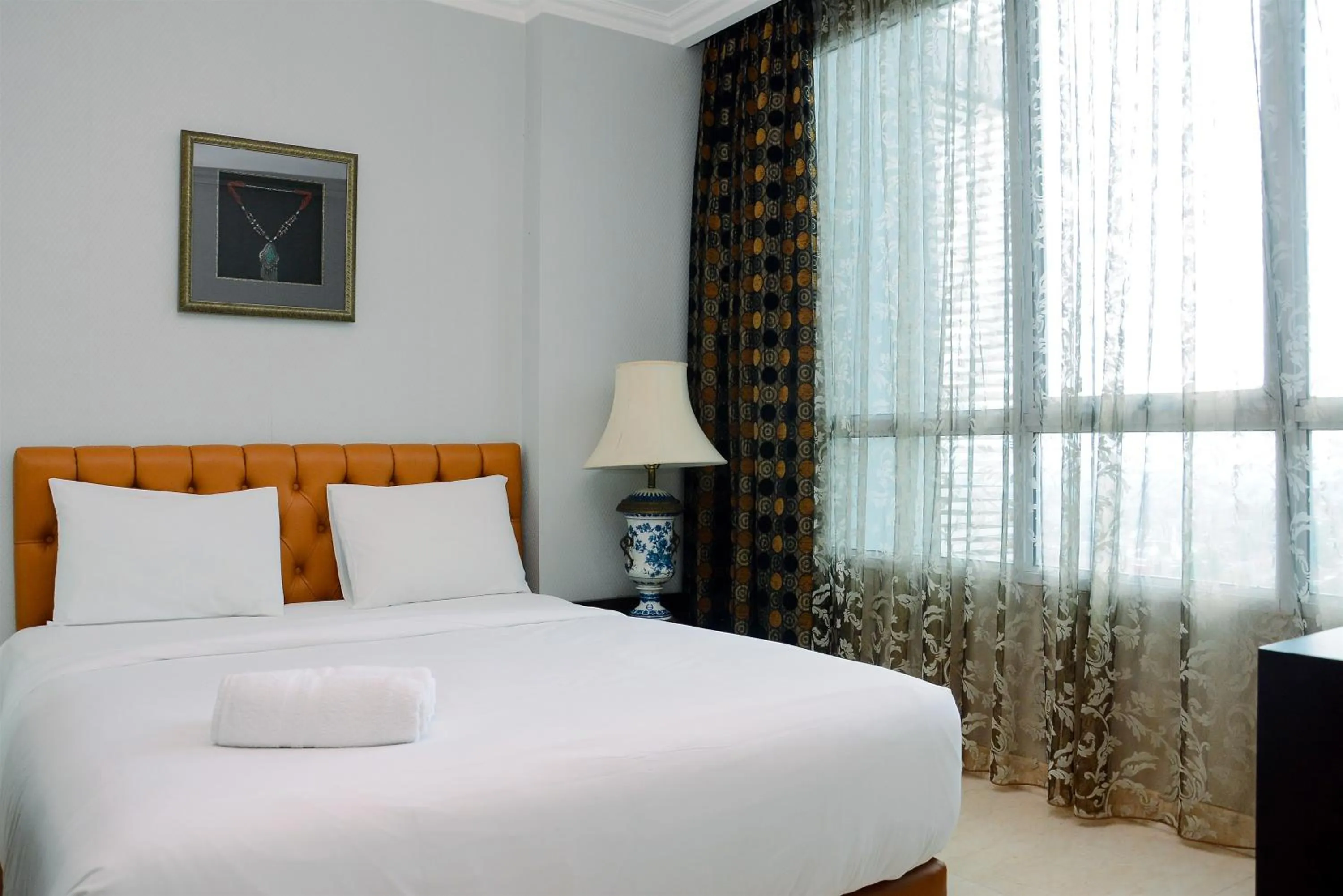 Bed in Modern and Luxurious 2BR Essence Dharmawangsa Apartment By Travelio