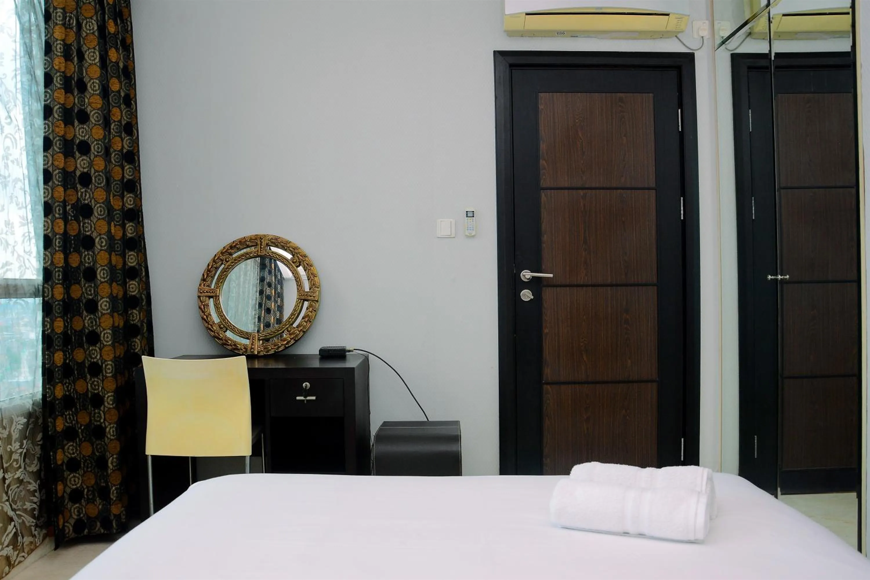 Bed in Modern and Luxurious 2BR Essence Dharmawangsa Apartment By Travelio