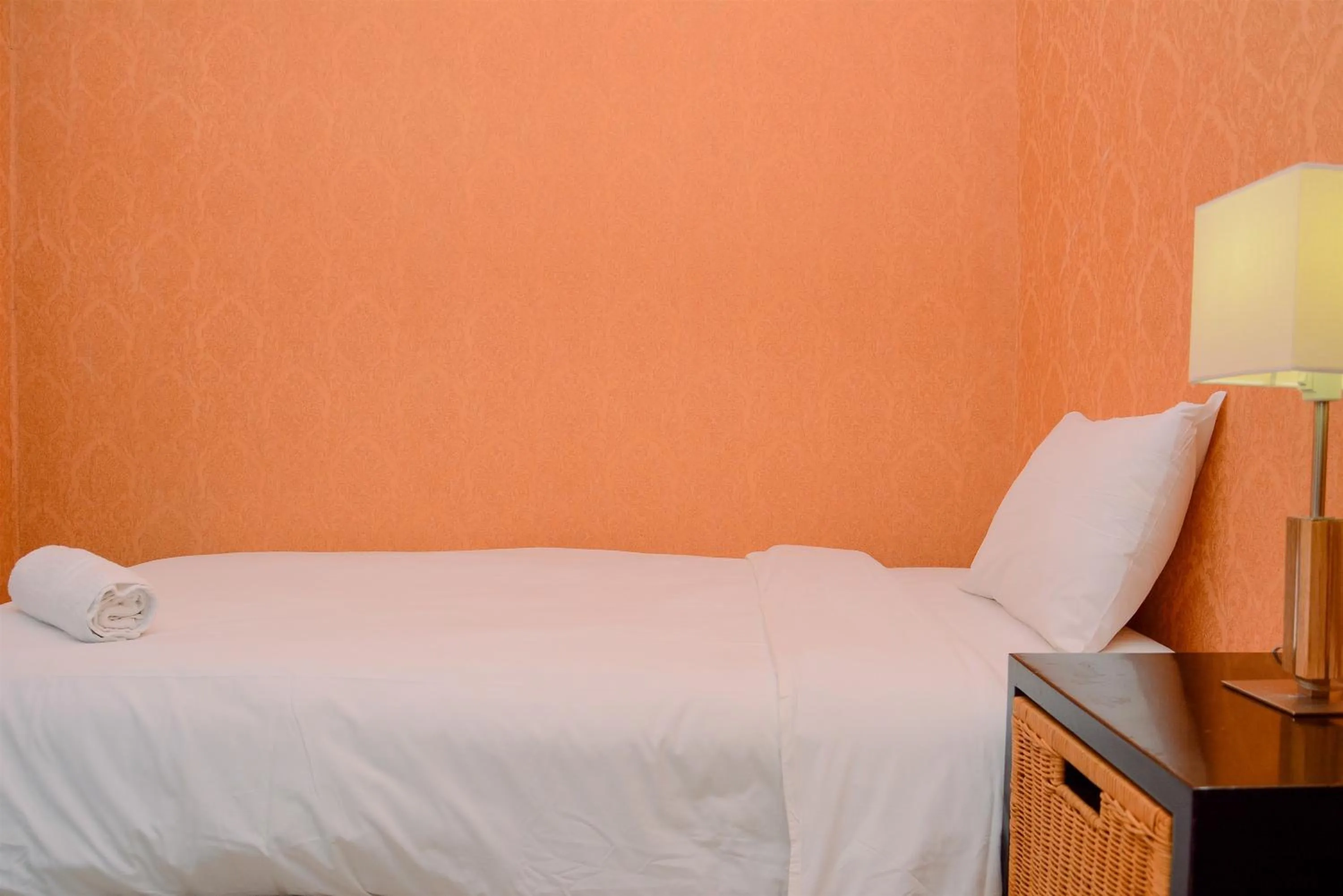 Bed in Modern and Luxurious 2BR Essence Dharmawangsa Apartment By Travelio