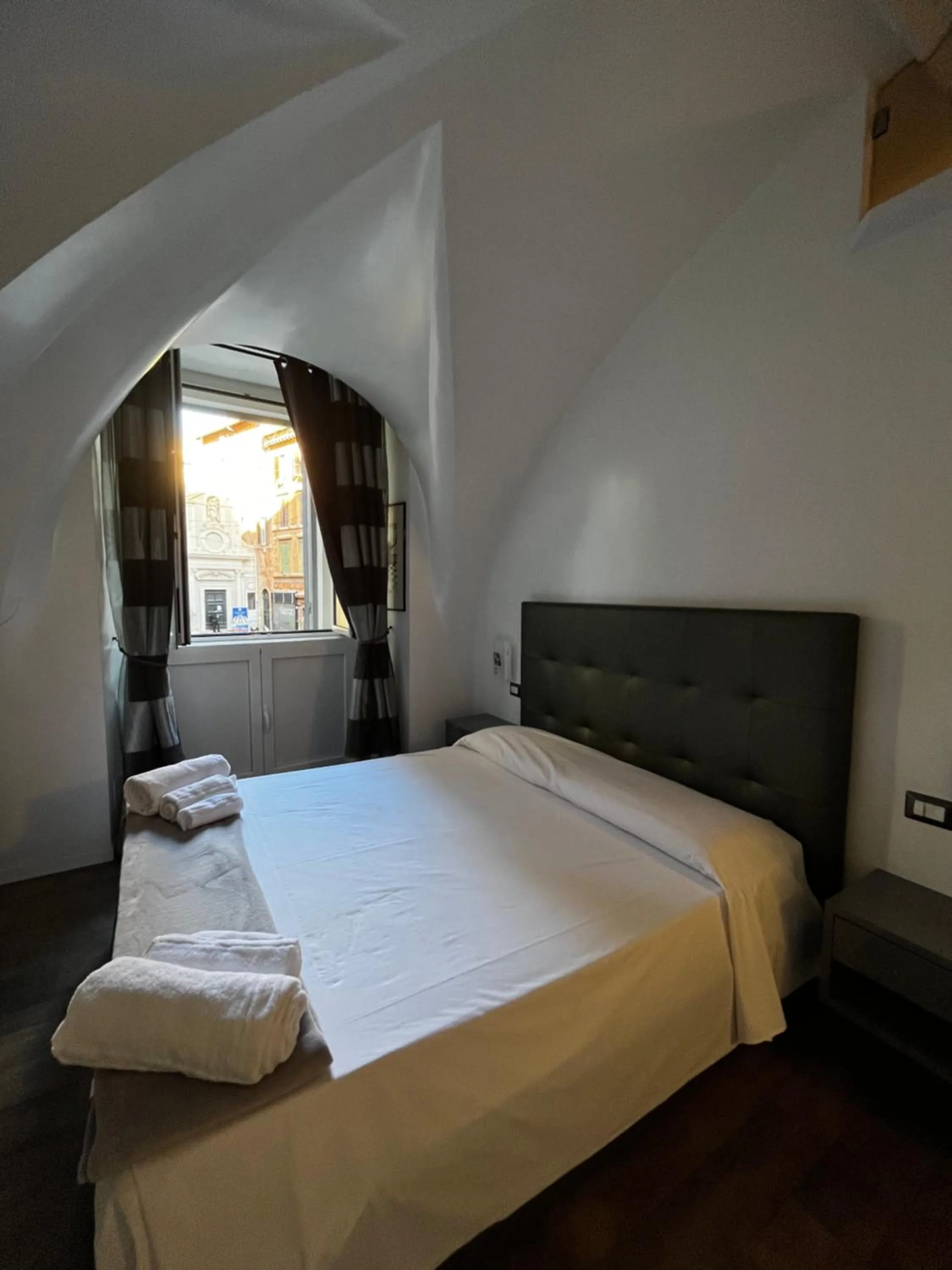 Bed in Casa Giorgia luxury apartment