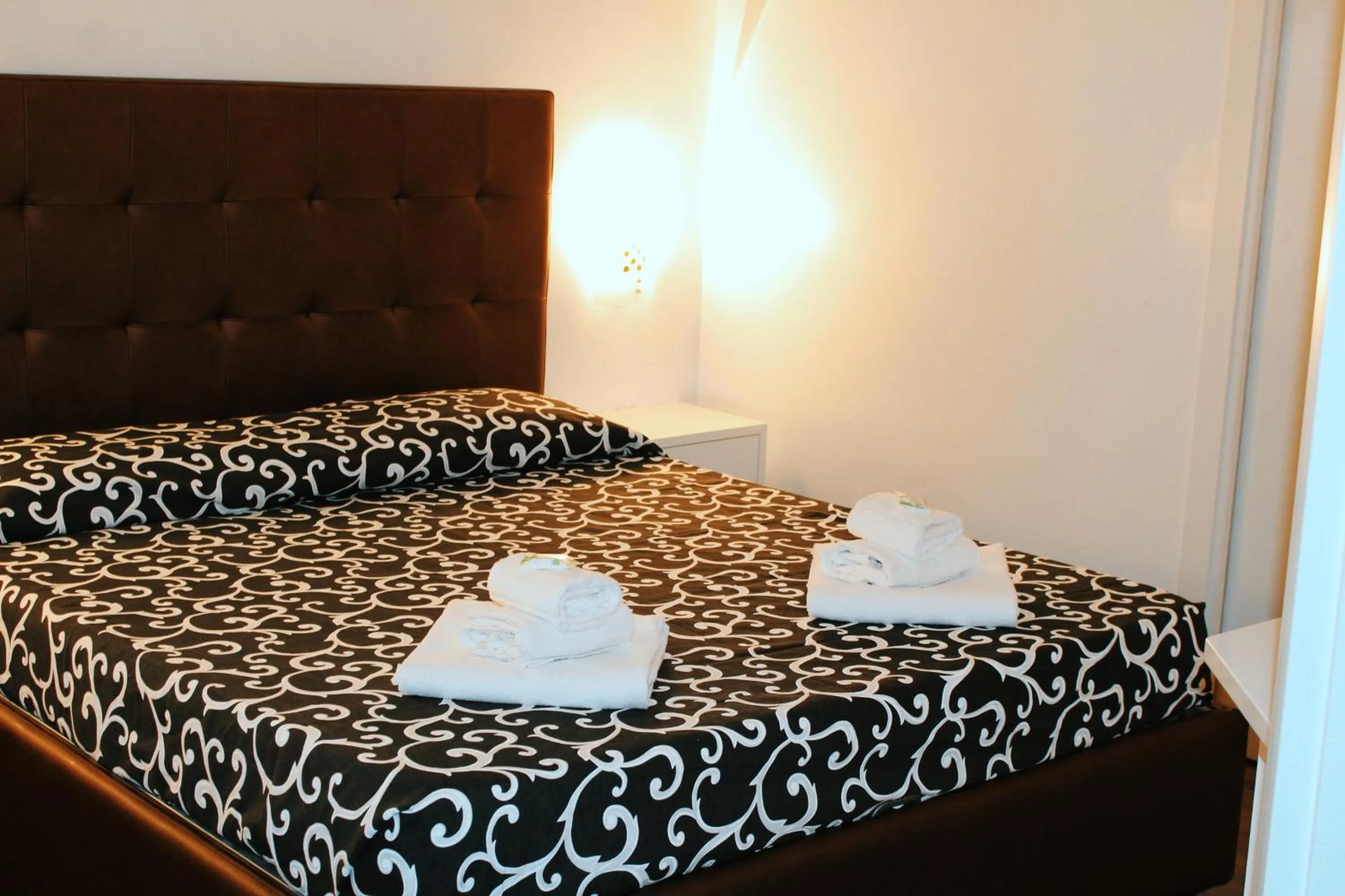 Bed in Casa Giorgia luxury apartment