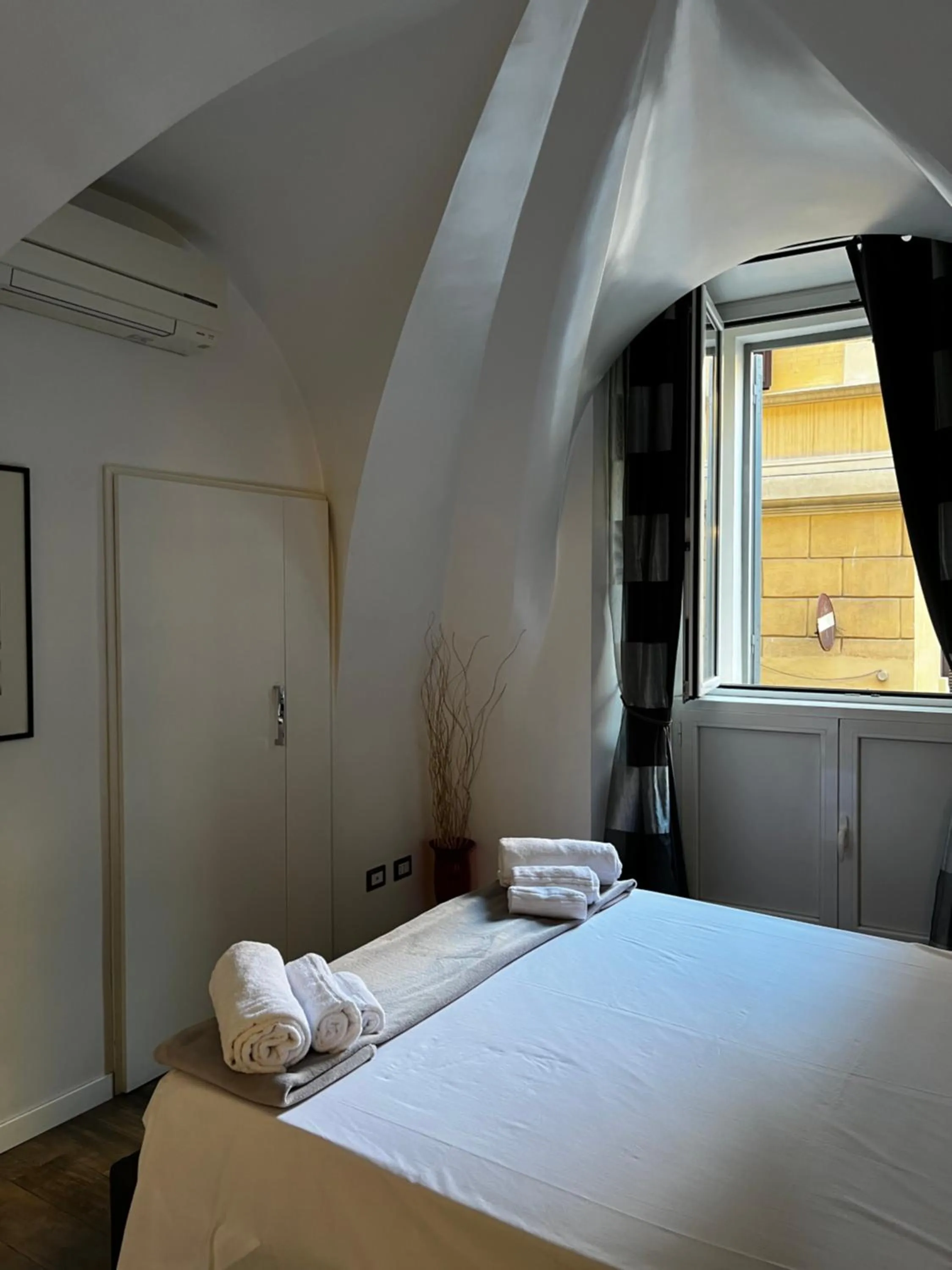 Bed in Casa Giorgia luxury apartment