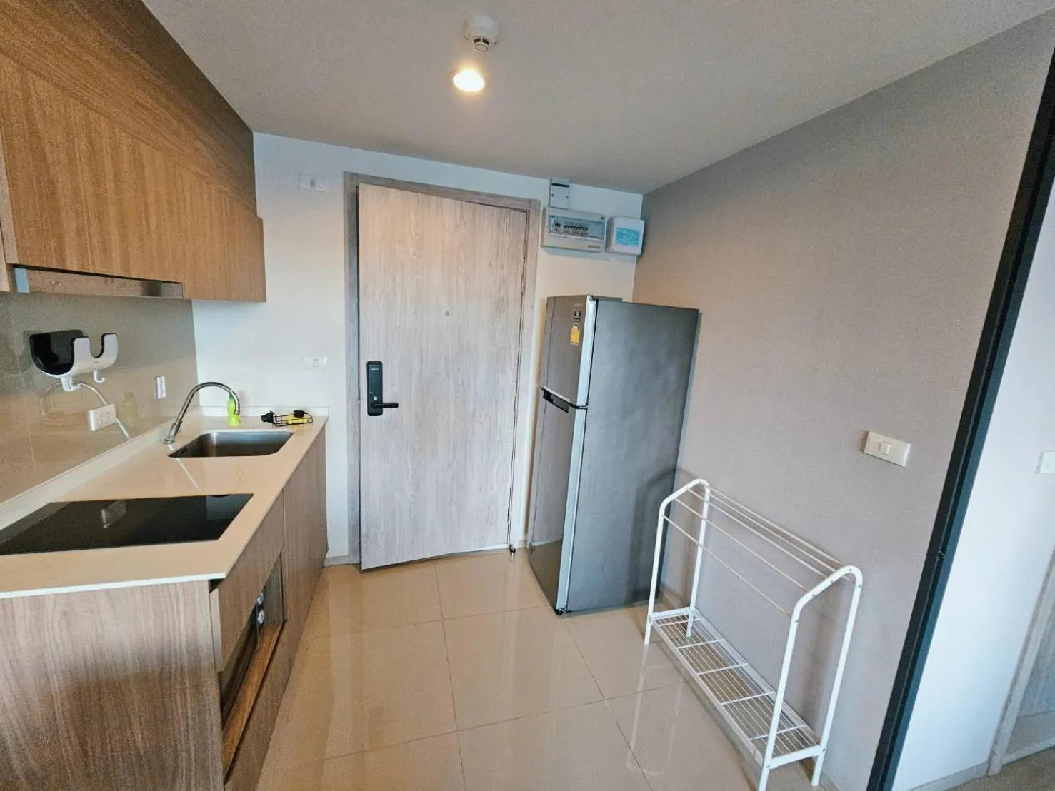 Kitchen or kitchenette in La Casita Huahin by Ying