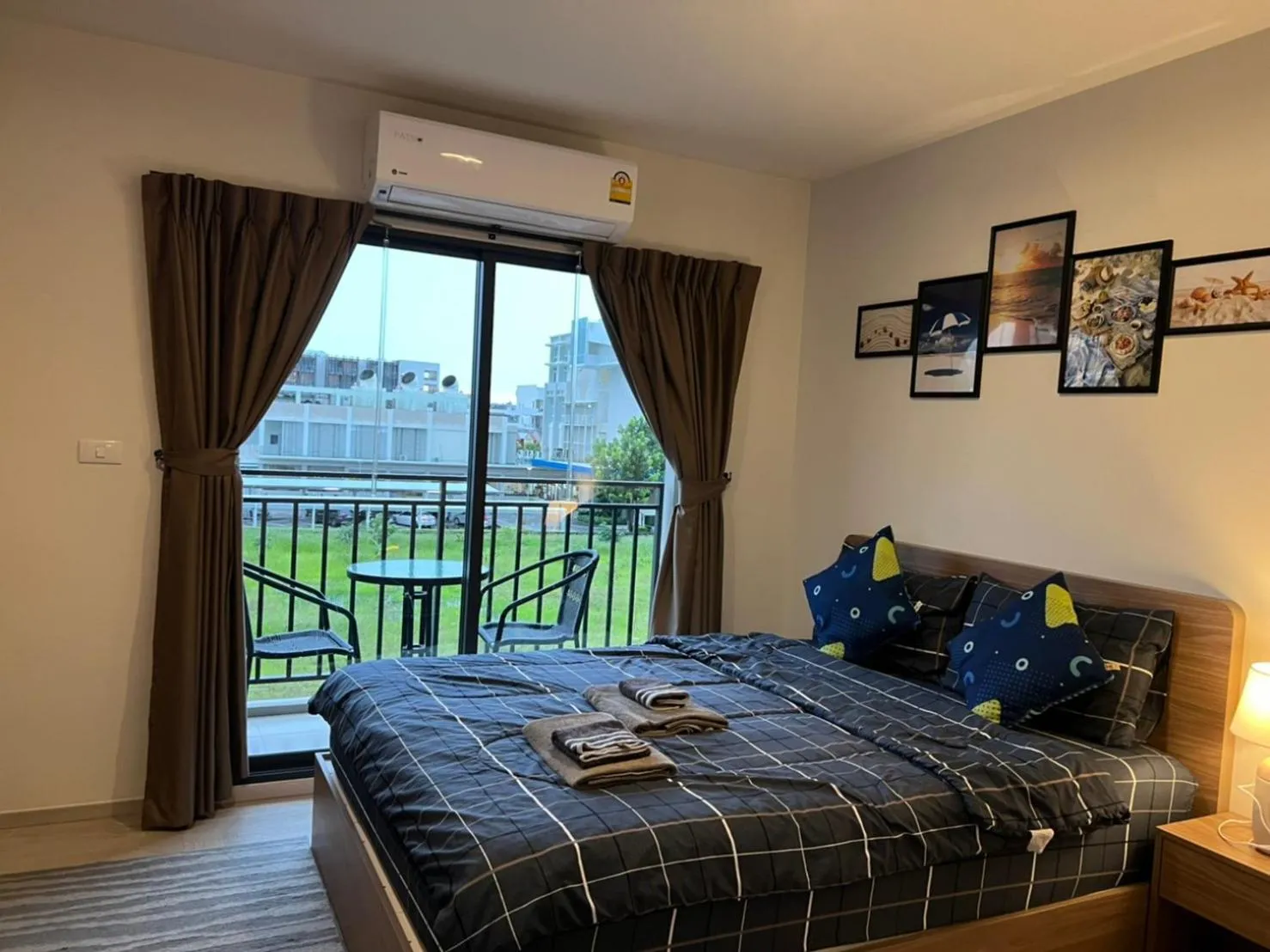 Bed in La Casita Huahin by Ying