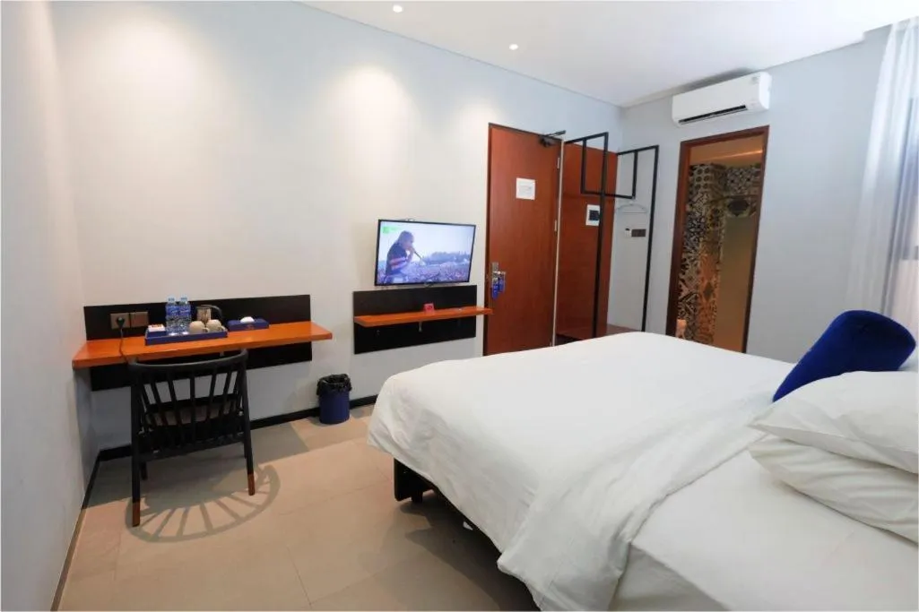 Bed in Hotel Youstay Semarang by Sinergi