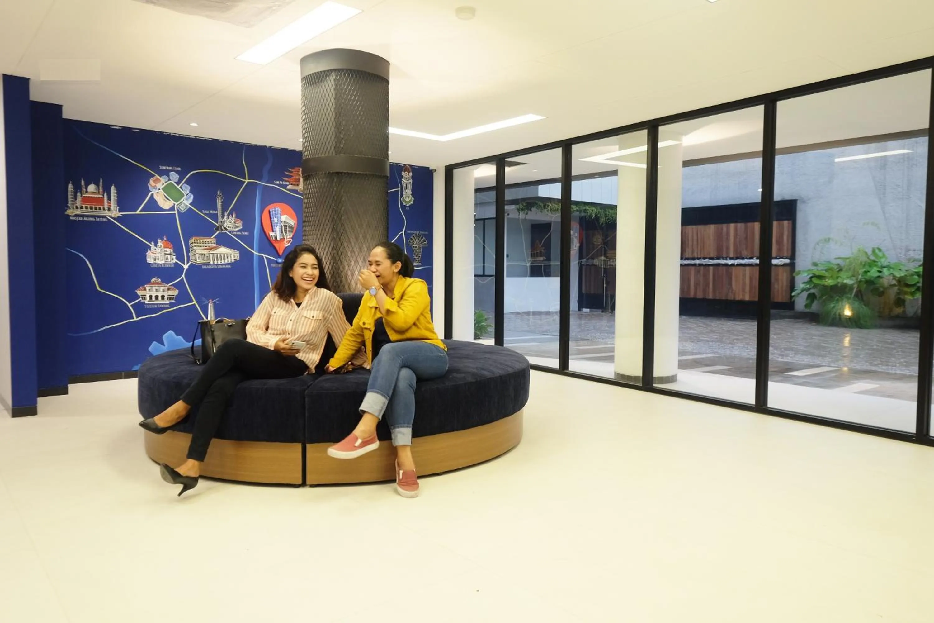 Lobby or reception in Hotel Youstay Semarang by Sinergi